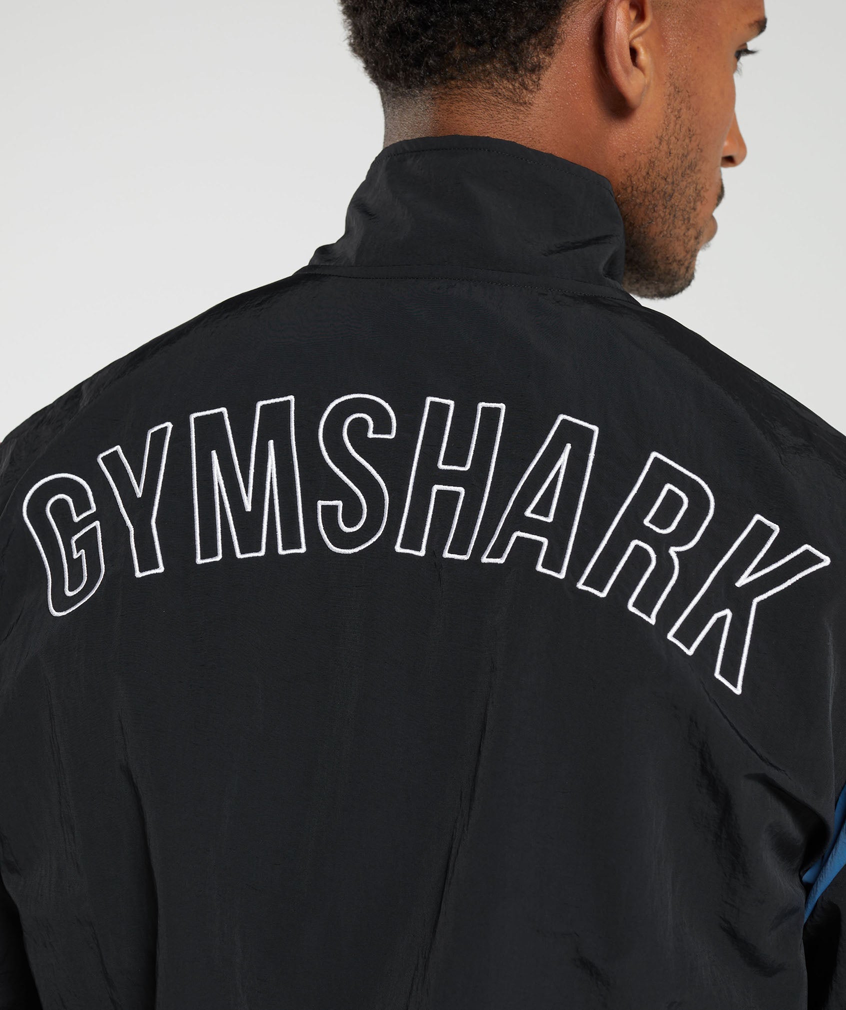gymshark-retro-track-jacket-black-blue-purple-soft-berry-aw23