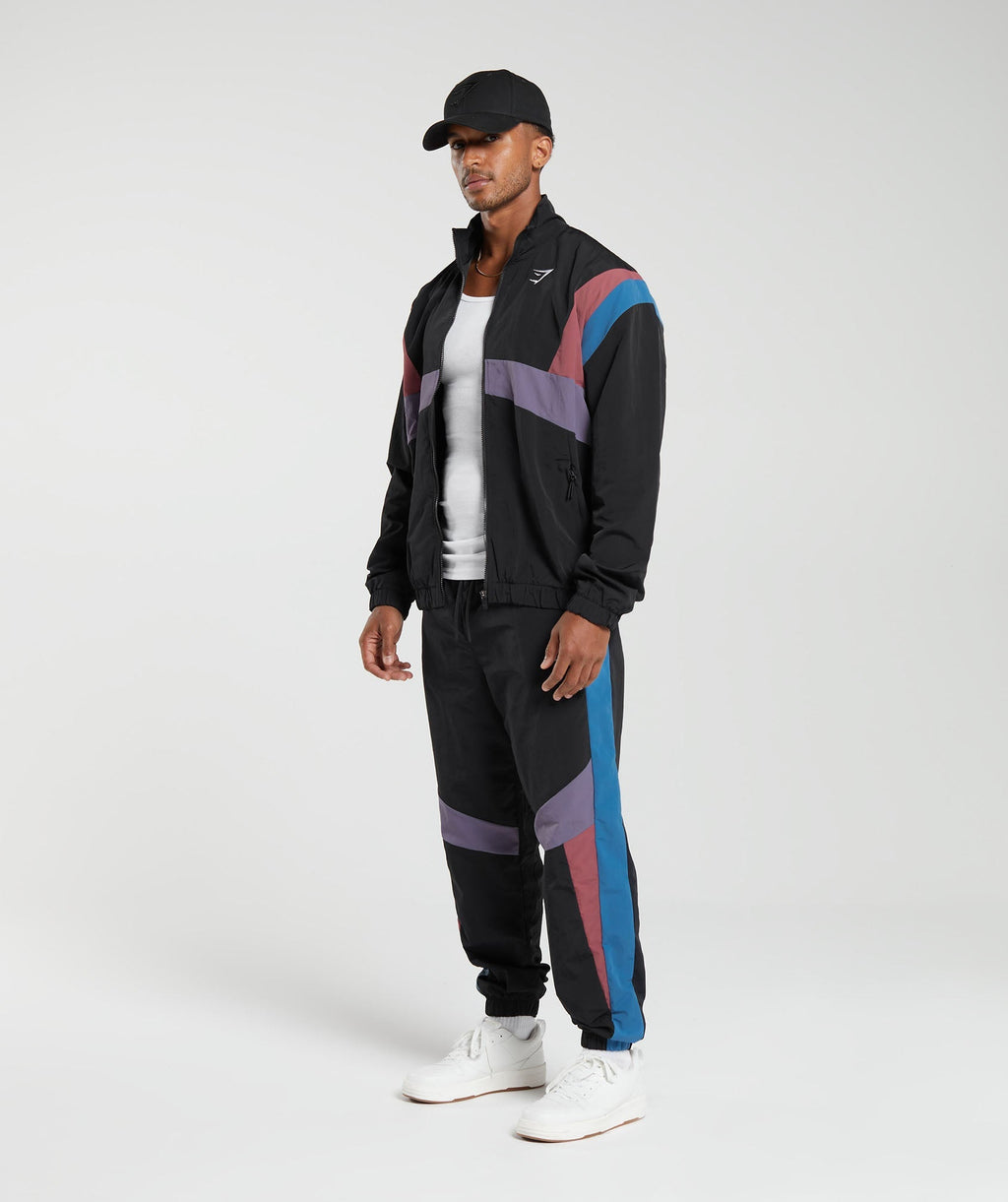 gymshark-retro-track-jacket-black-blue-purple-soft-berry-aw23