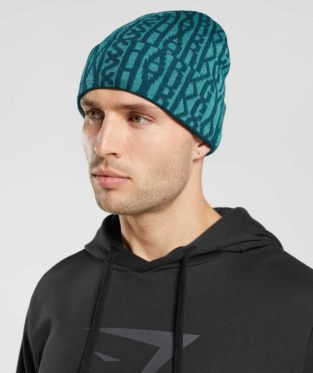 gymshark-reversable-jacquard-beanie-winter-teal-slate-blue-aw22