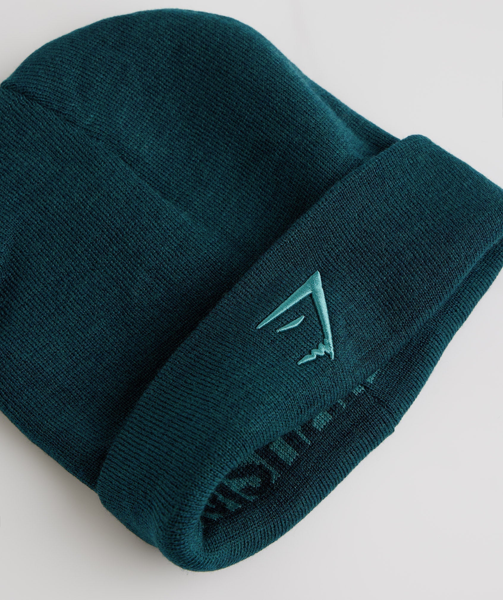 gymshark-reversable-jacquard-beanie-winter-teal-slate-blue-aw22