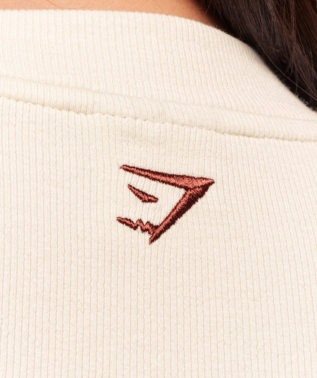 gymshark-ribbed-cotton-crop-top-oat-white-burgundy-brown-ss25
