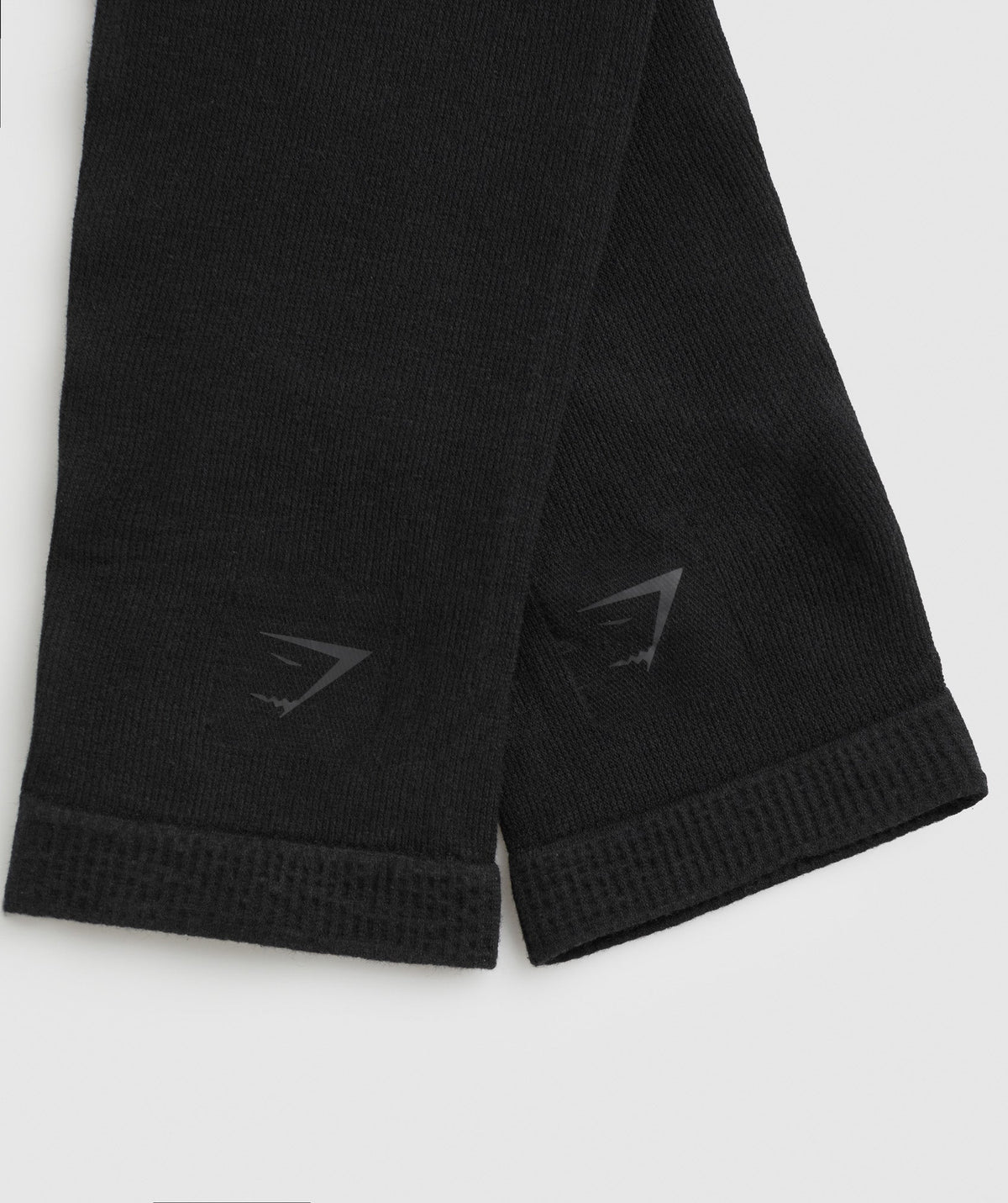 gymshark-ribbed-cotton-seamless-leg-warmers-black-ss24
