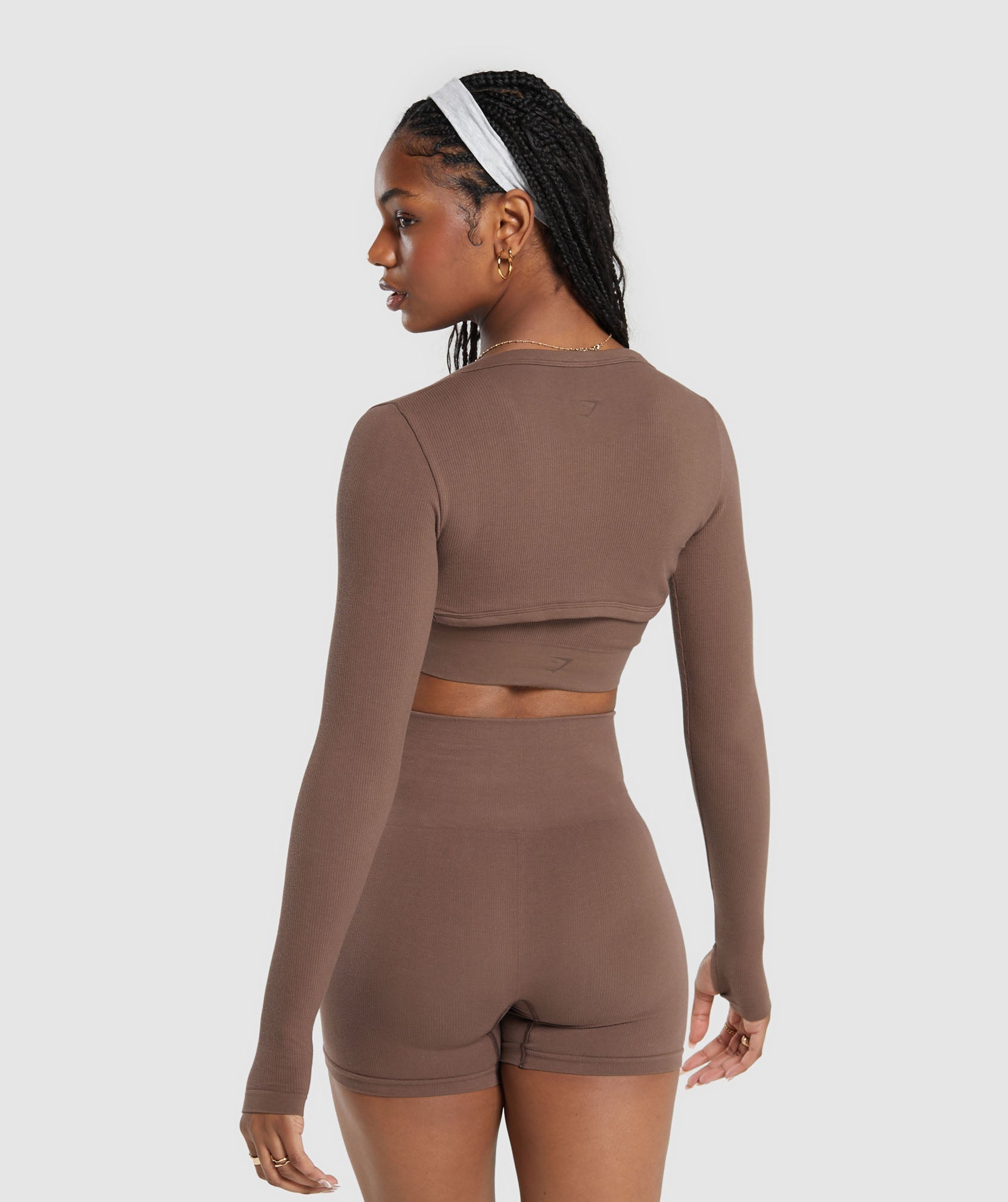 gymshark-ribbed-cotton-seamless-shrug-ls-tops-brown-ss24