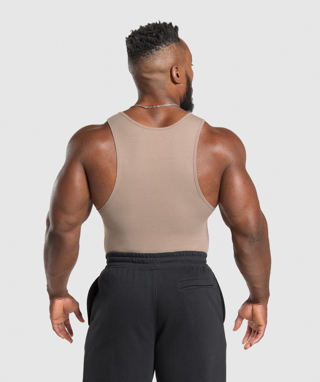 gymshark-ribbed-tank-3pk-denim-grey-pebble-grey-lifestyle-brown-ss25