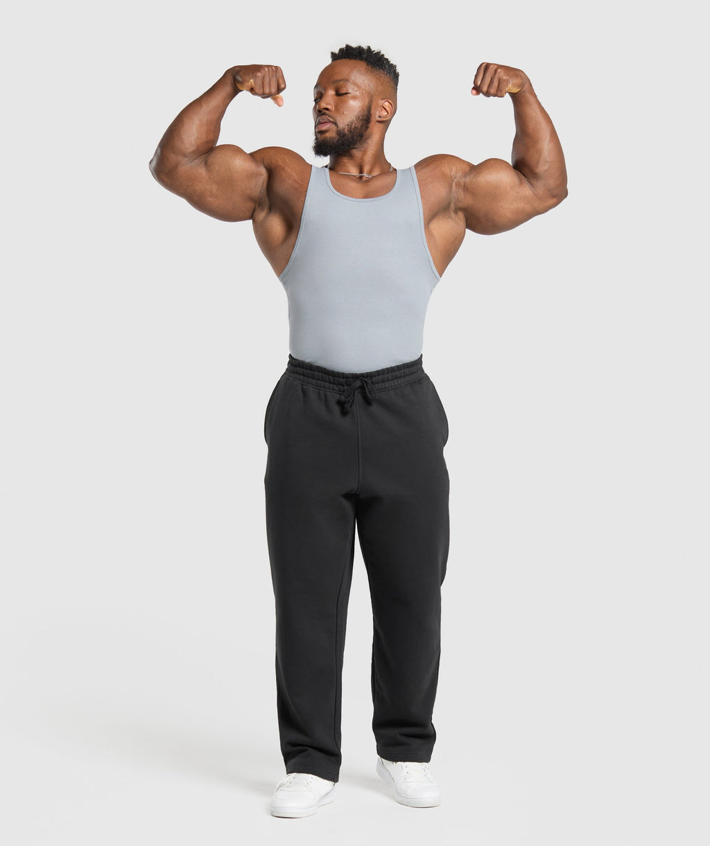 gymshark-ribbed-tank-3pk-denim-grey-pebble-grey-lifestyle-brown-ss25