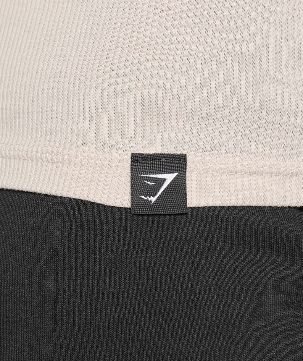 gymshark-ribbed-tank-3pk-denim-grey-pebble-grey-lifestyle-brown-ss25
