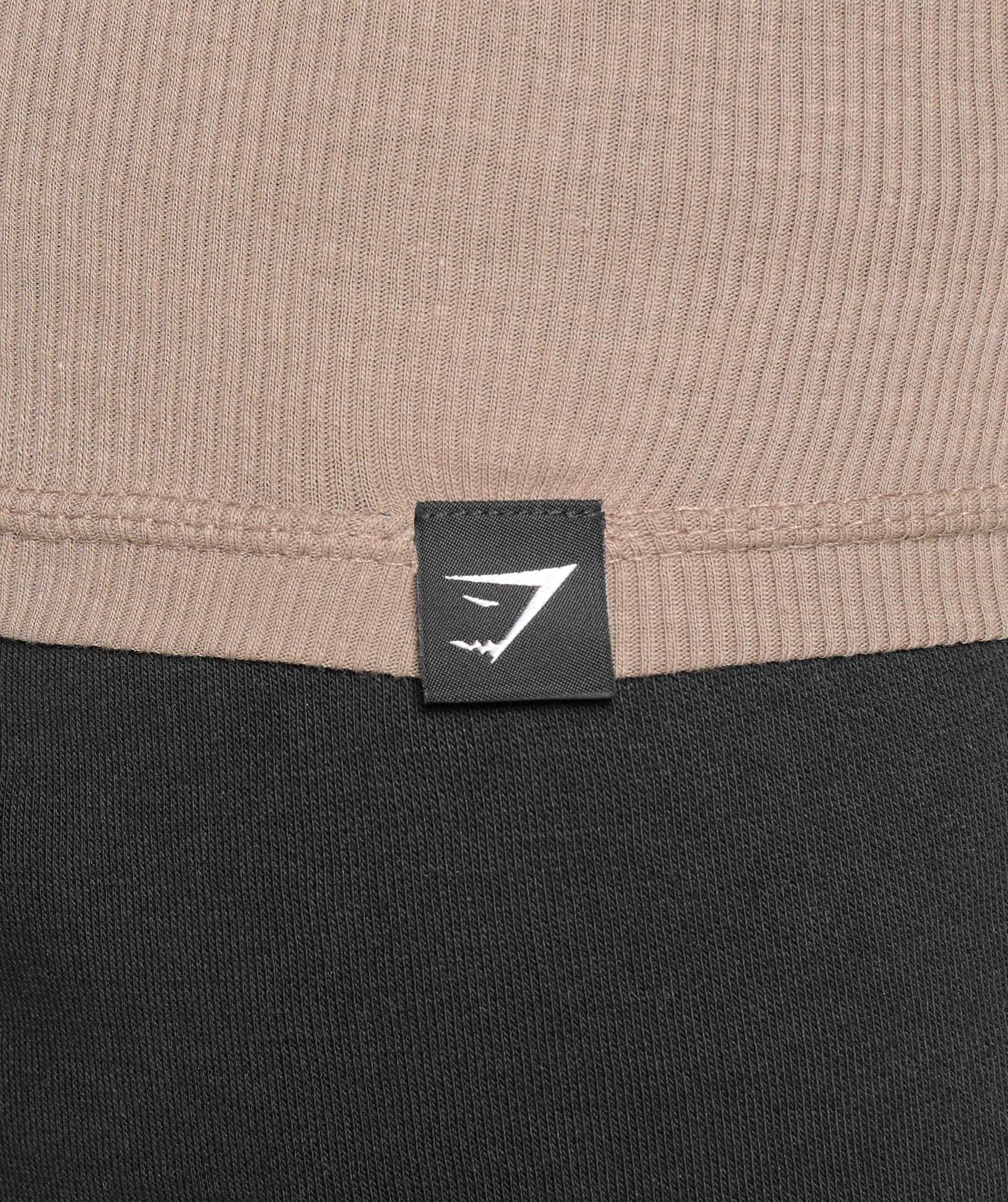 gymshark-ribbed-tank-3pk-denim-grey-pebble-grey-lifestyle-brown-ss25
