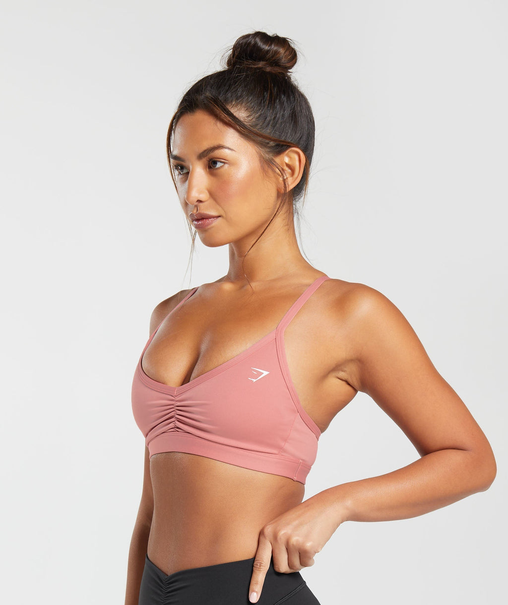 gymshark-ruched-strappy-sports-bra-classic-pink-aw23