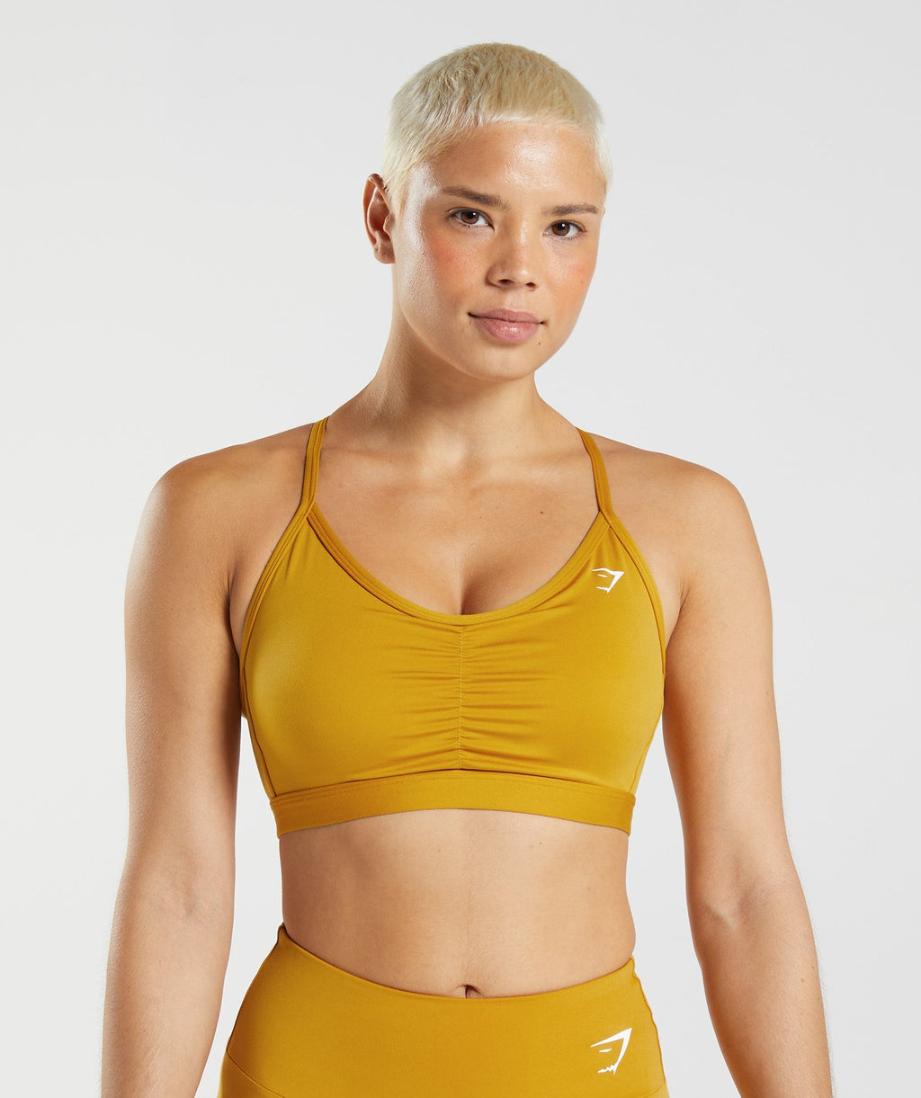 gymshark-ruched-sports-bra-turmeric-yellow-aw22