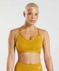 gymshark-ruched-sports-bra-turmeric-yellow-aw22