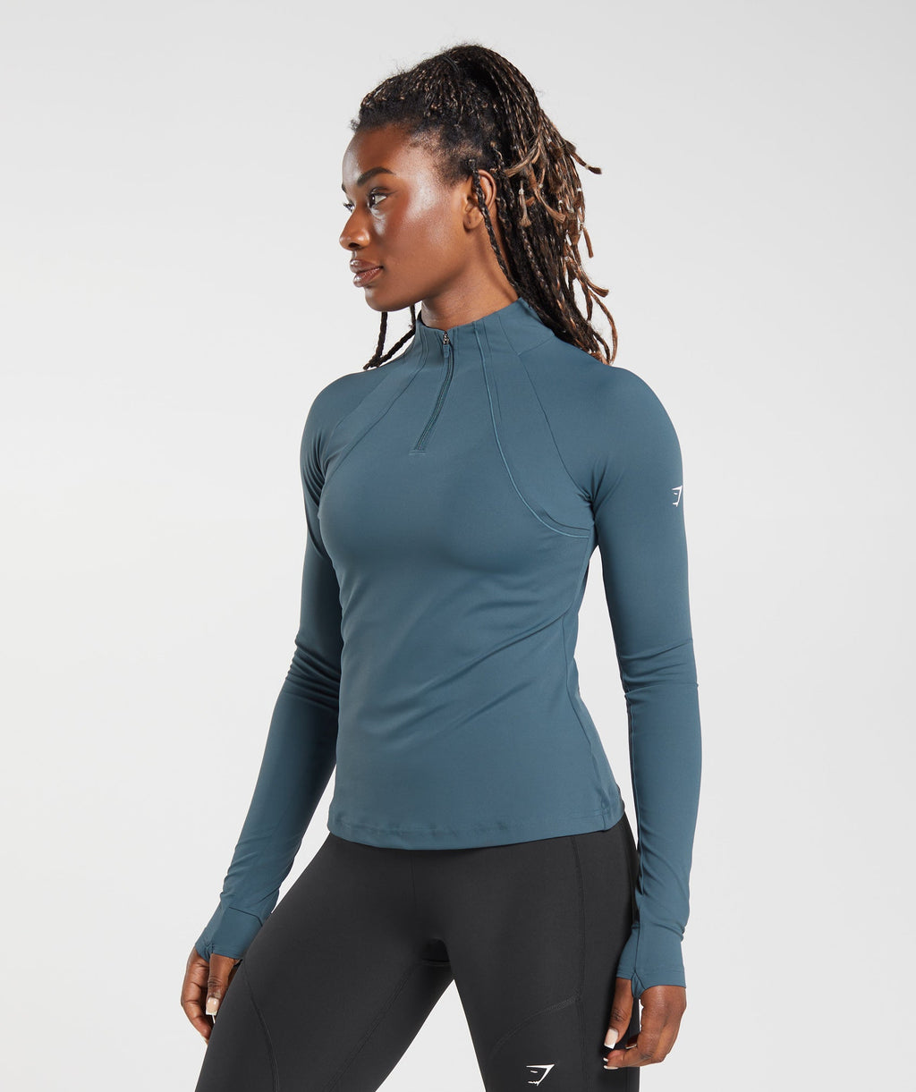 gymshark-running-1-4-zip-smokey-teal-aw23