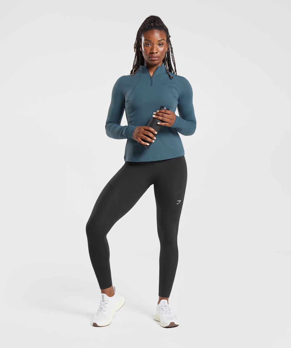 gymshark-running-1-4-zip-smokey-teal-aw23