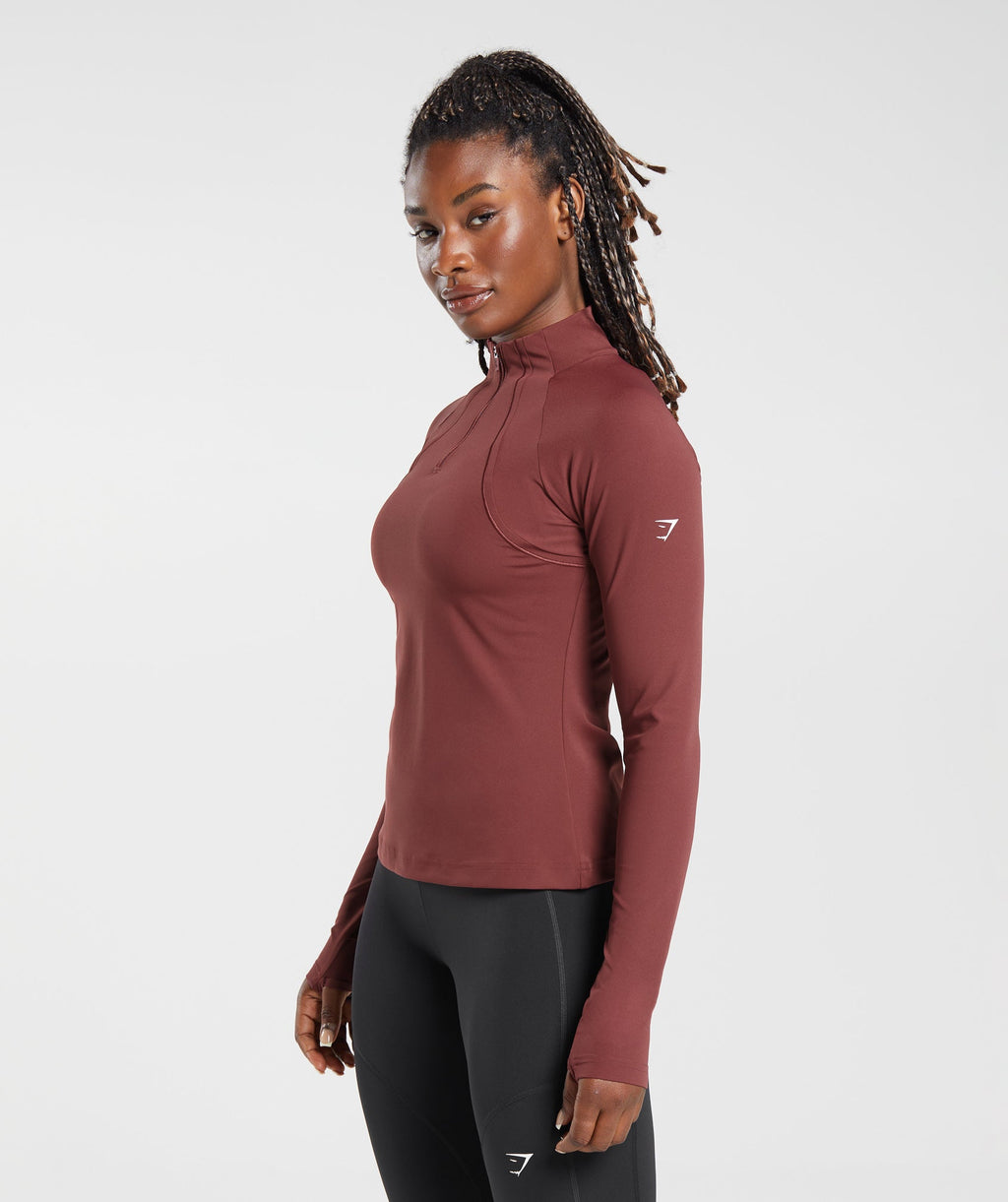 gymshark-running-1-4-zip-washed-burgundy-aw23