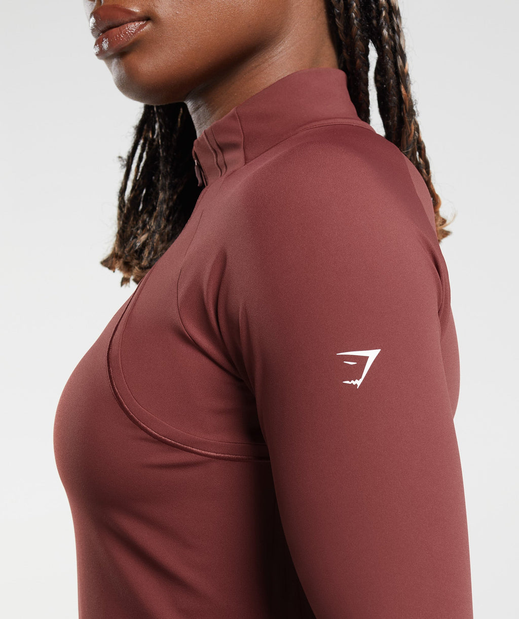 gymshark-running-1-4-zip-washed-burgundy-aw23