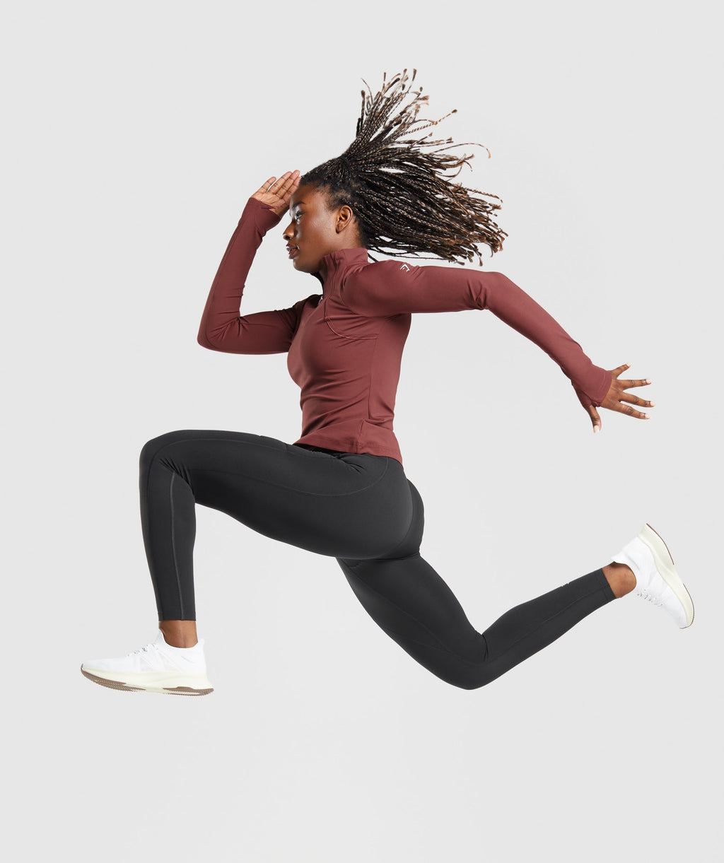 gymshark-running-1-4-zip-washed-burgundy-aw23