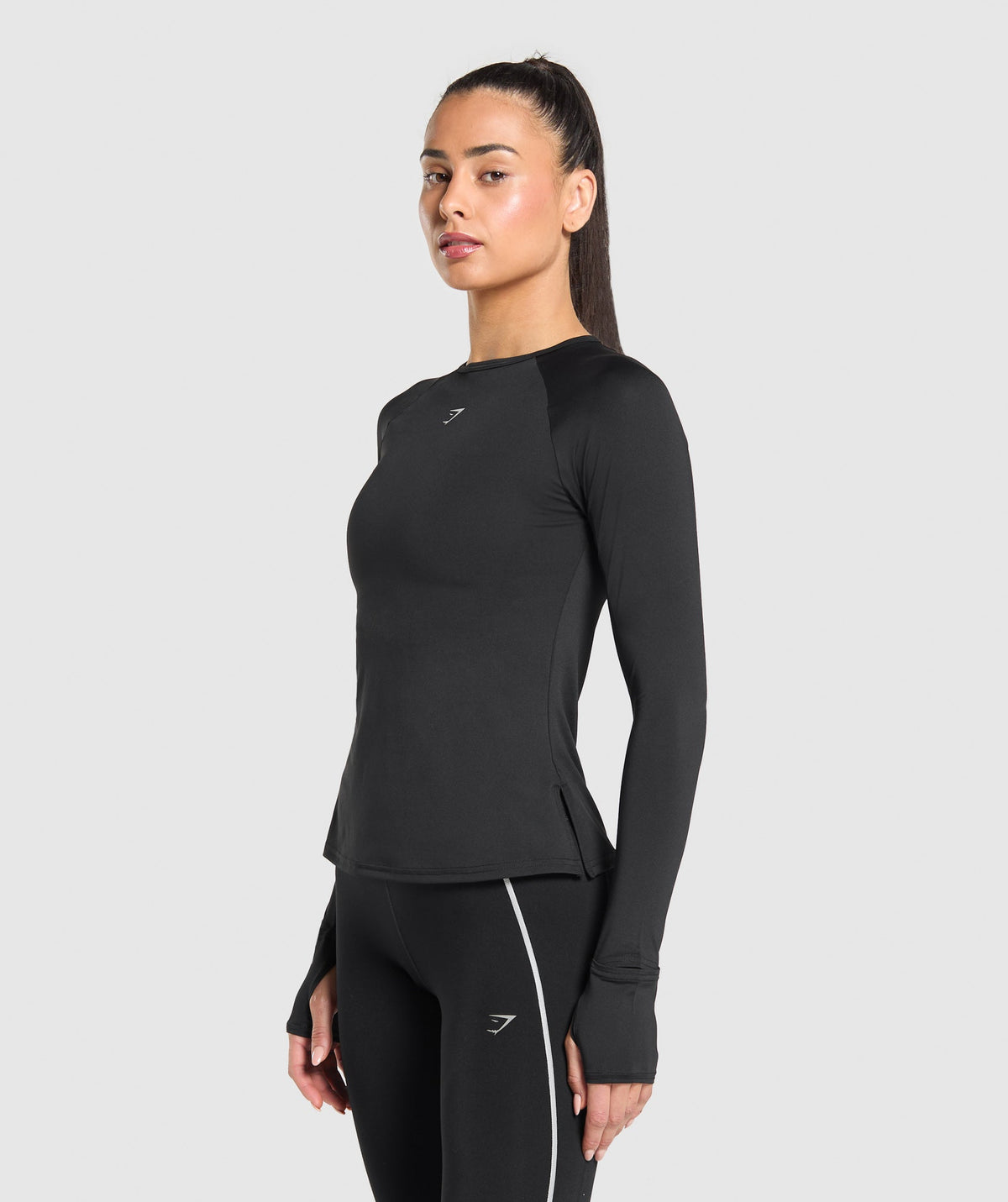 gymshark-running-long-sleeve-top-black-ss25