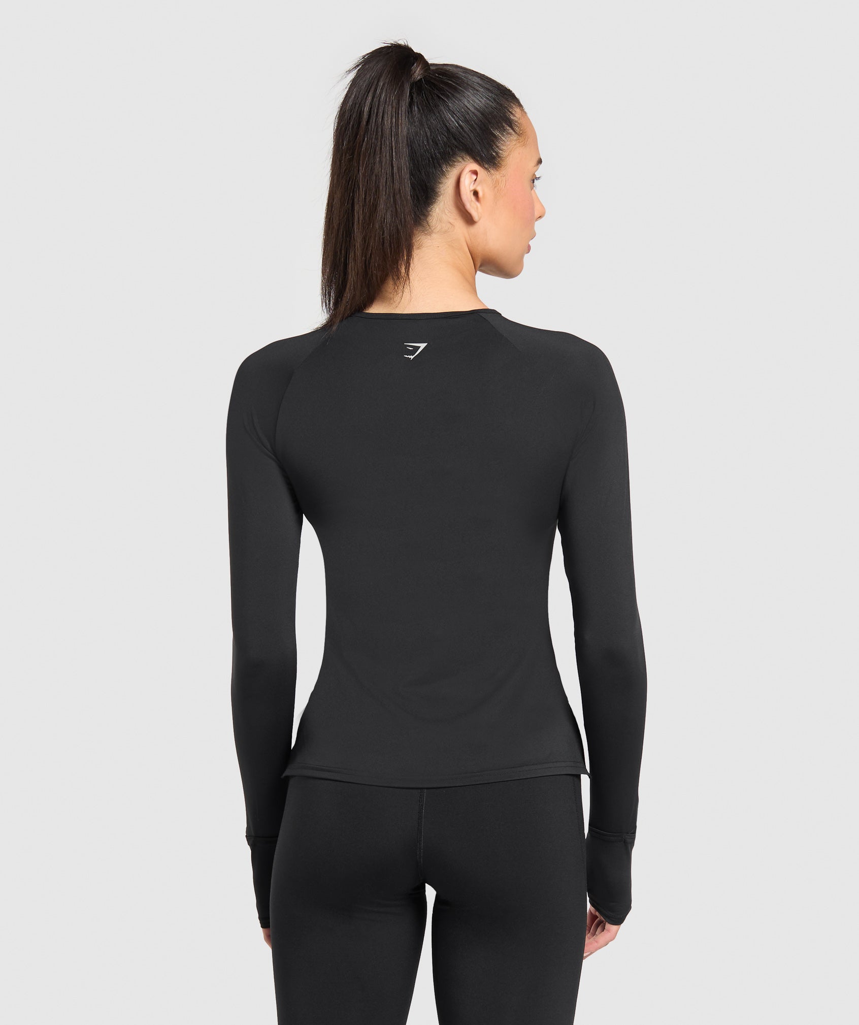 gymshark-running-long-sleeve-top-black-ss25