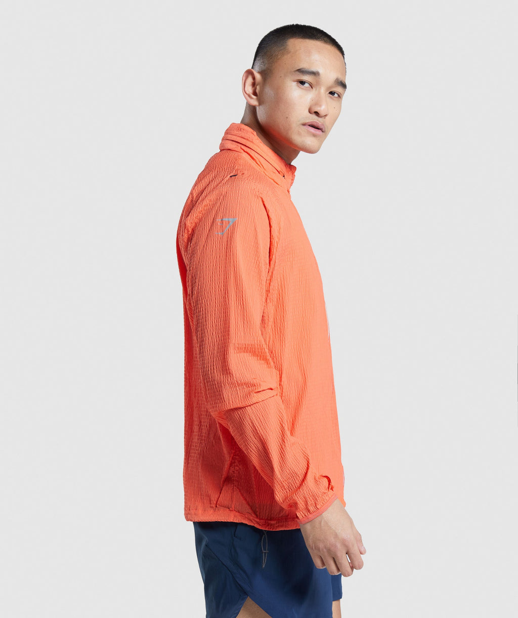 gymshark-speed-windbreaker-papaya-orange-ss22