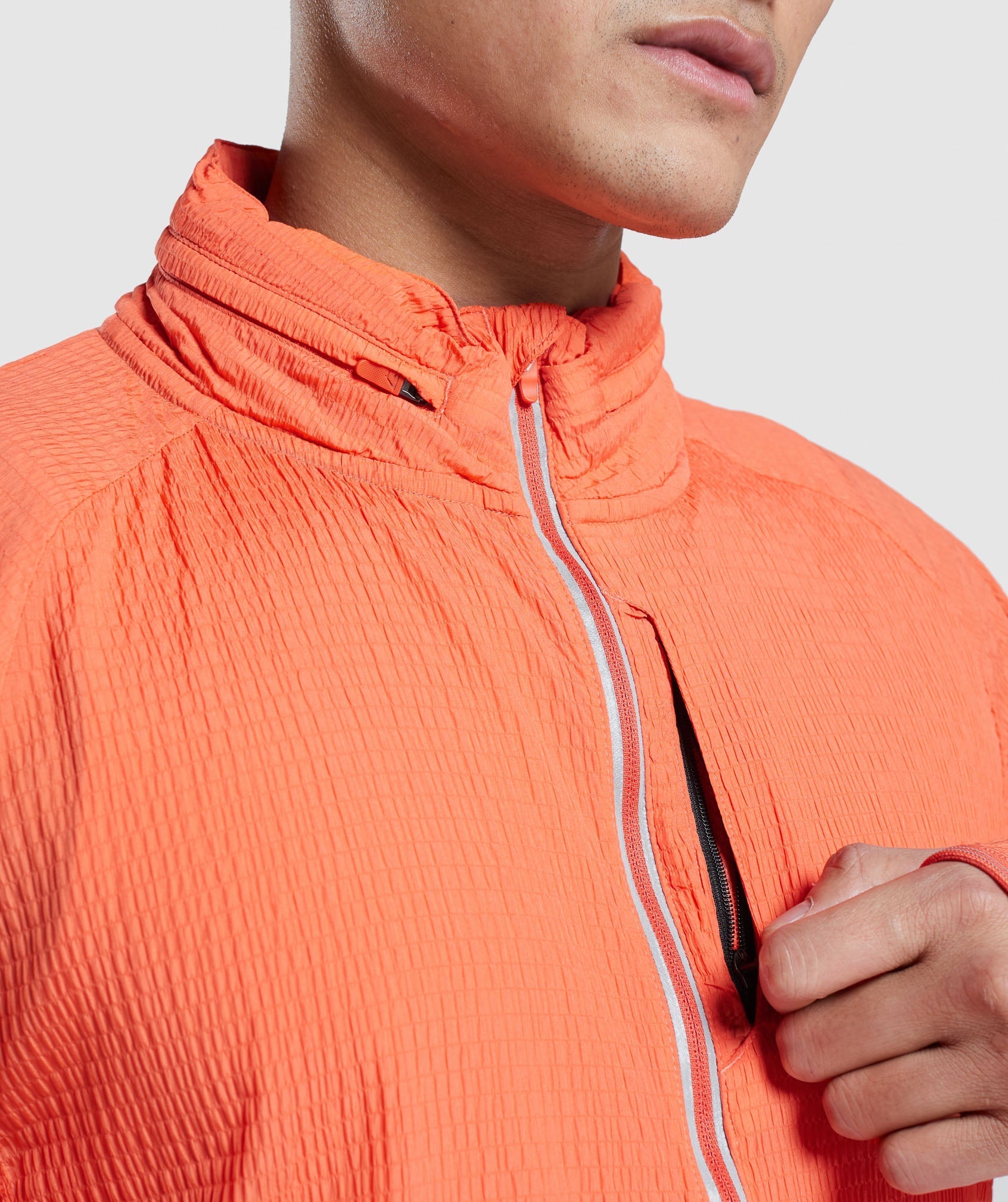 gymshark-speed-windbreaker-papaya-orange-ss22