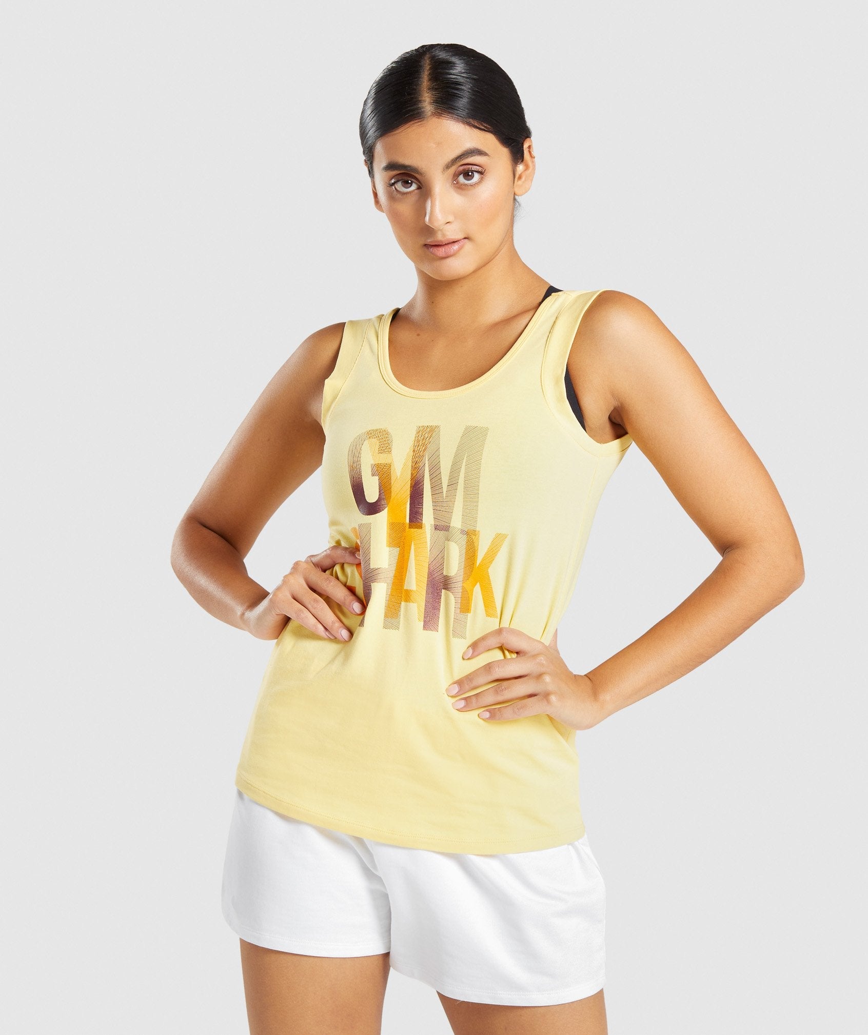 gymshark-strobe-graphic-tank-light-yellow