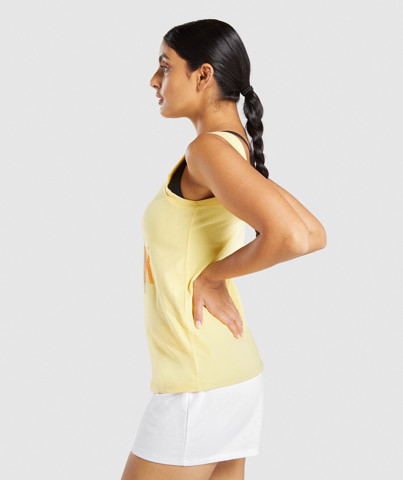 gymshark-strobe-graphic-tank-light-yellow