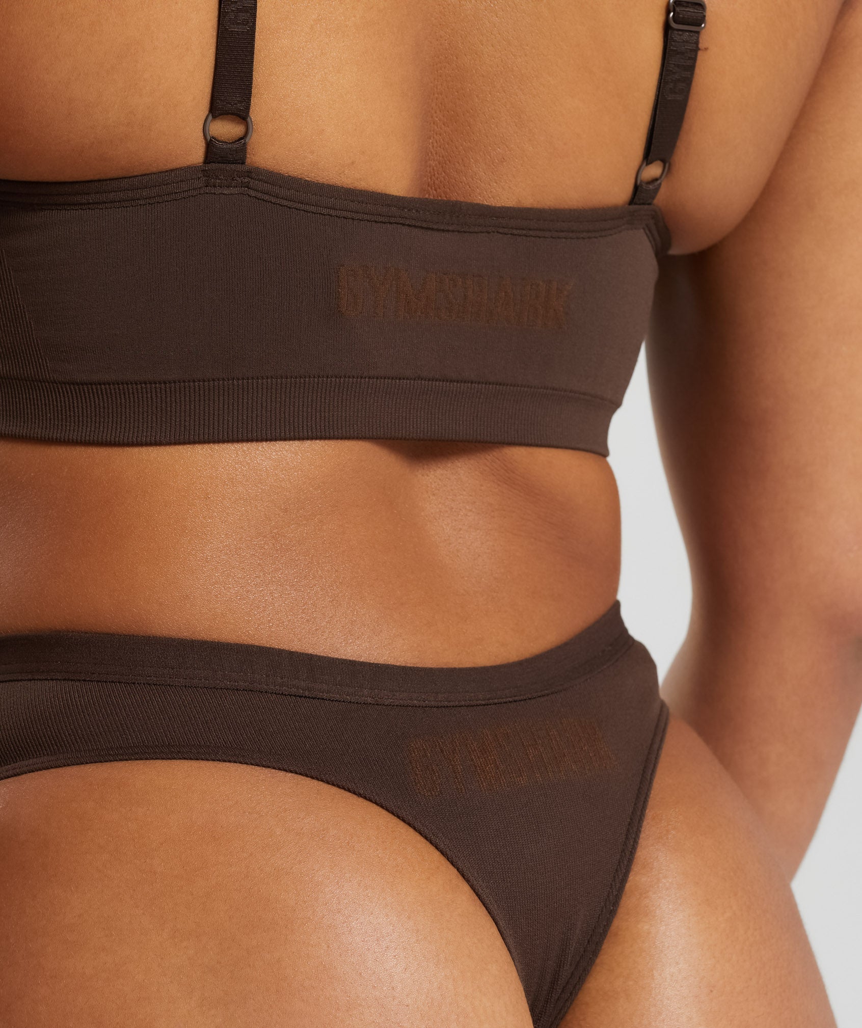 gymshark-seamless-dipped-front-thong-archive-brown-ss24