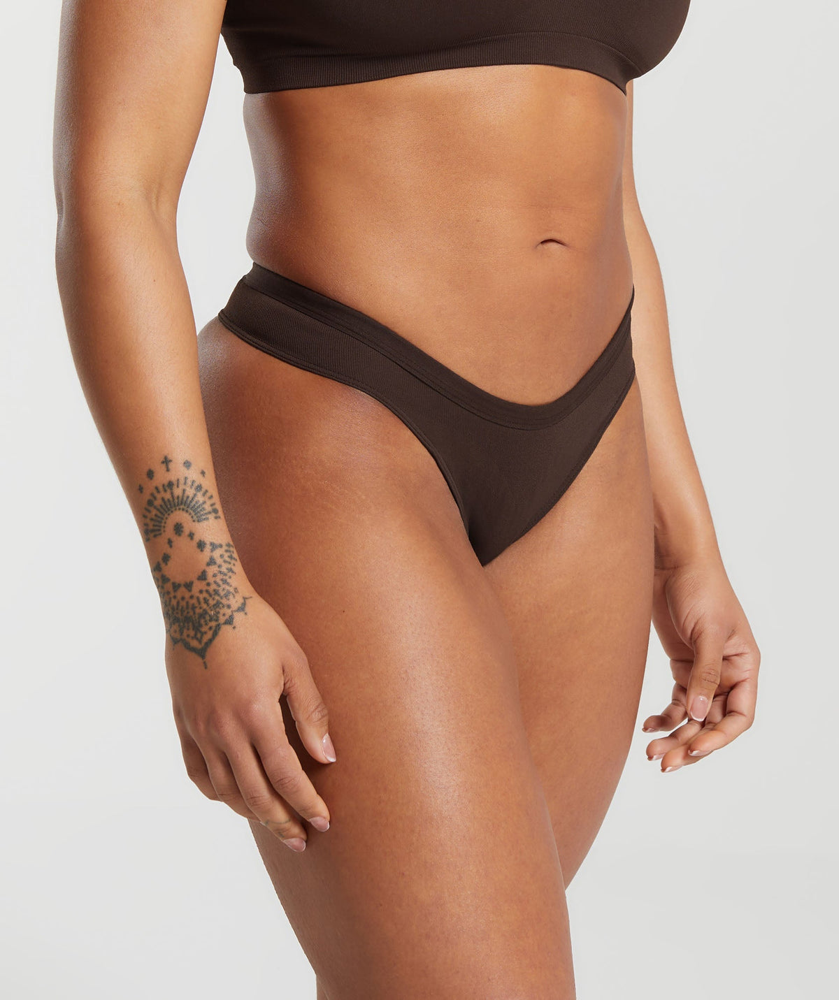 gymshark-seamless-dipped-front-thong-archive-brown-ss24
