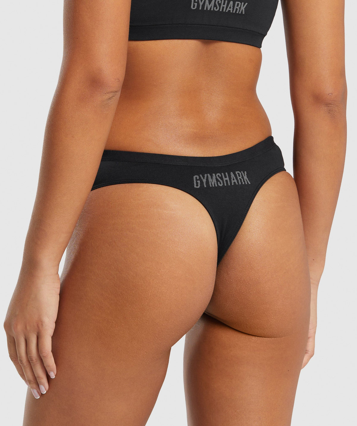 gymshark-seamless-dipped-front-thong-black-ss24