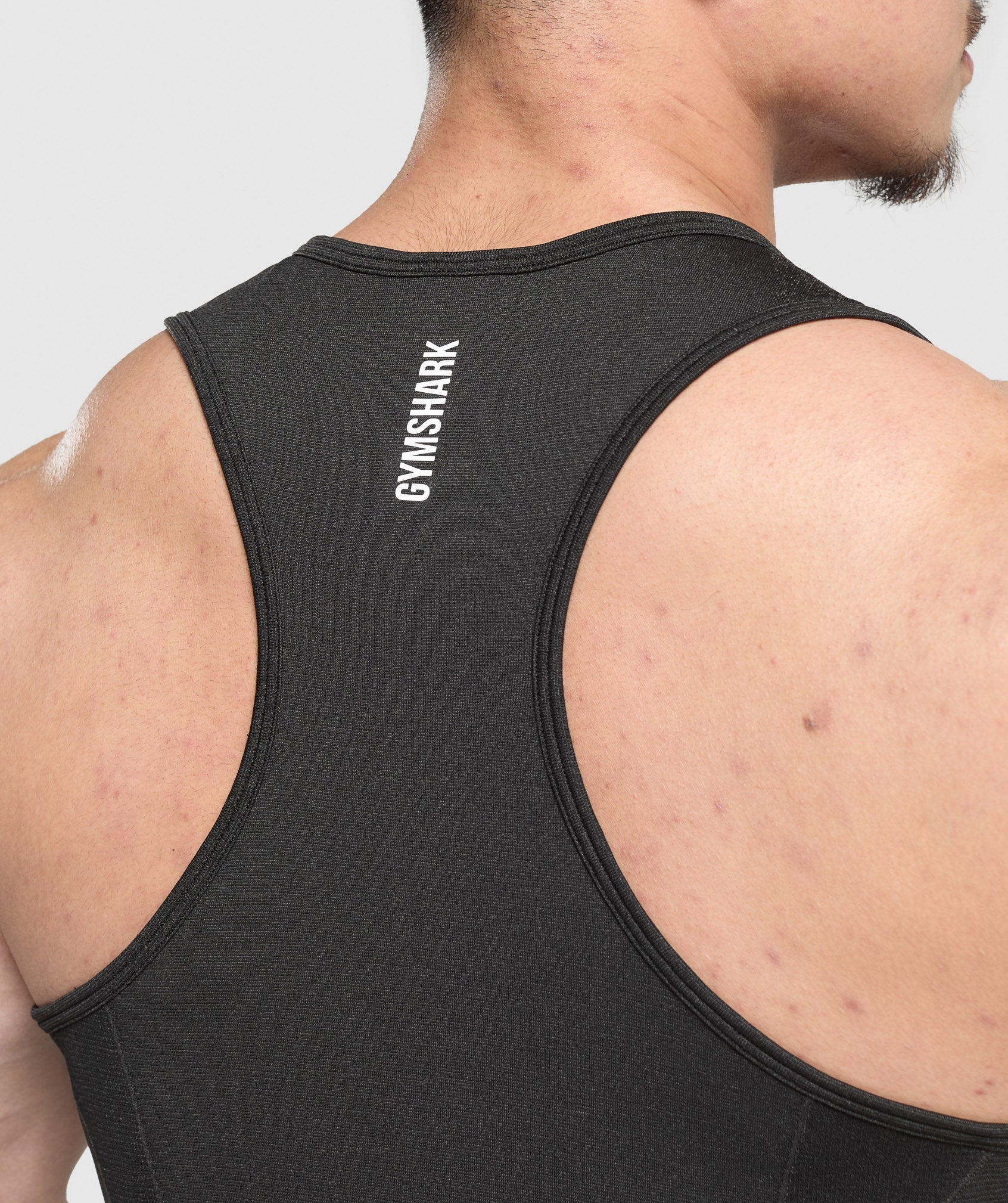 gymshark-shadow-seamless-stringer-black-aw24