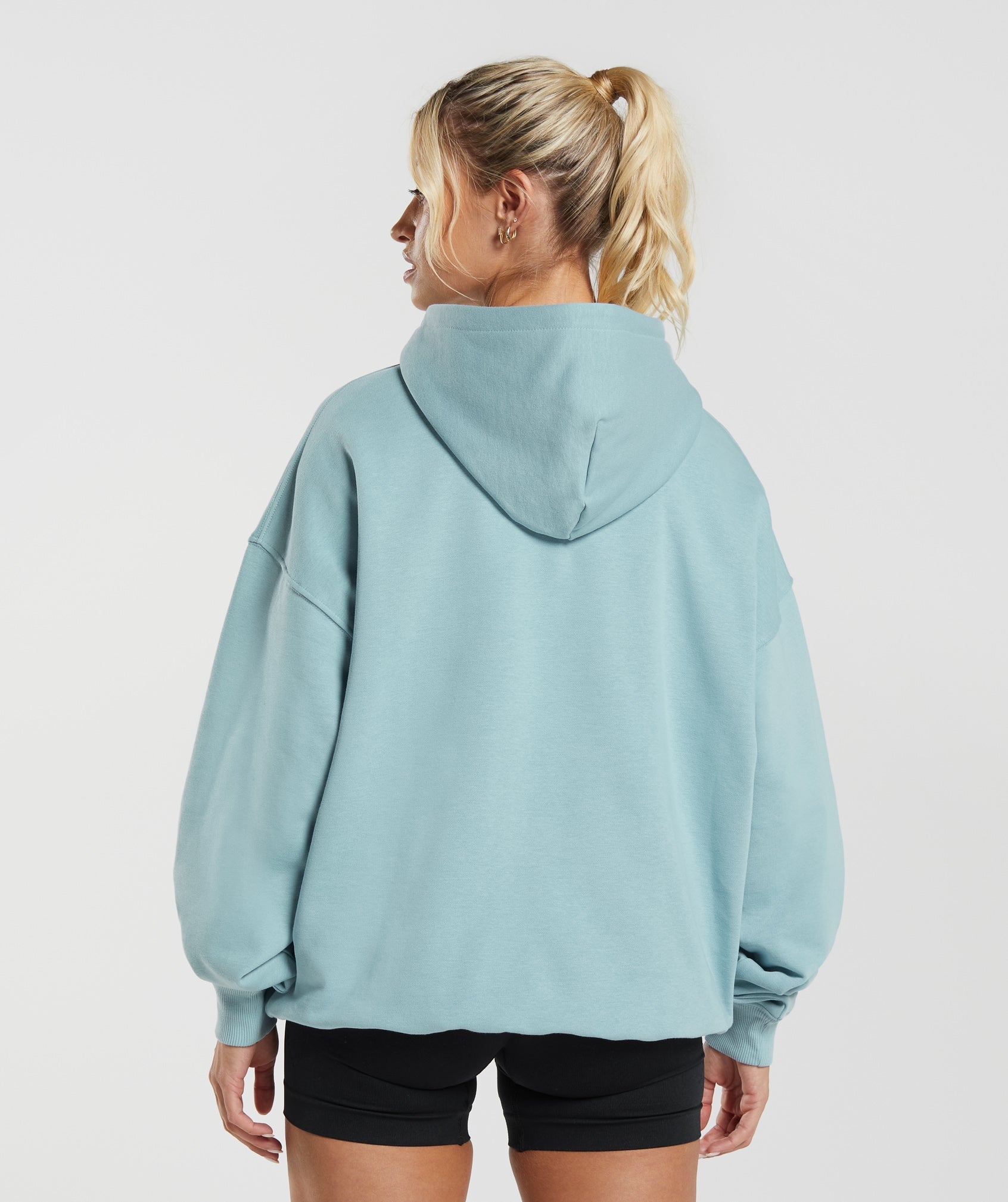 gymshark-shark-attack-oversized-hoodie-blue-aw23