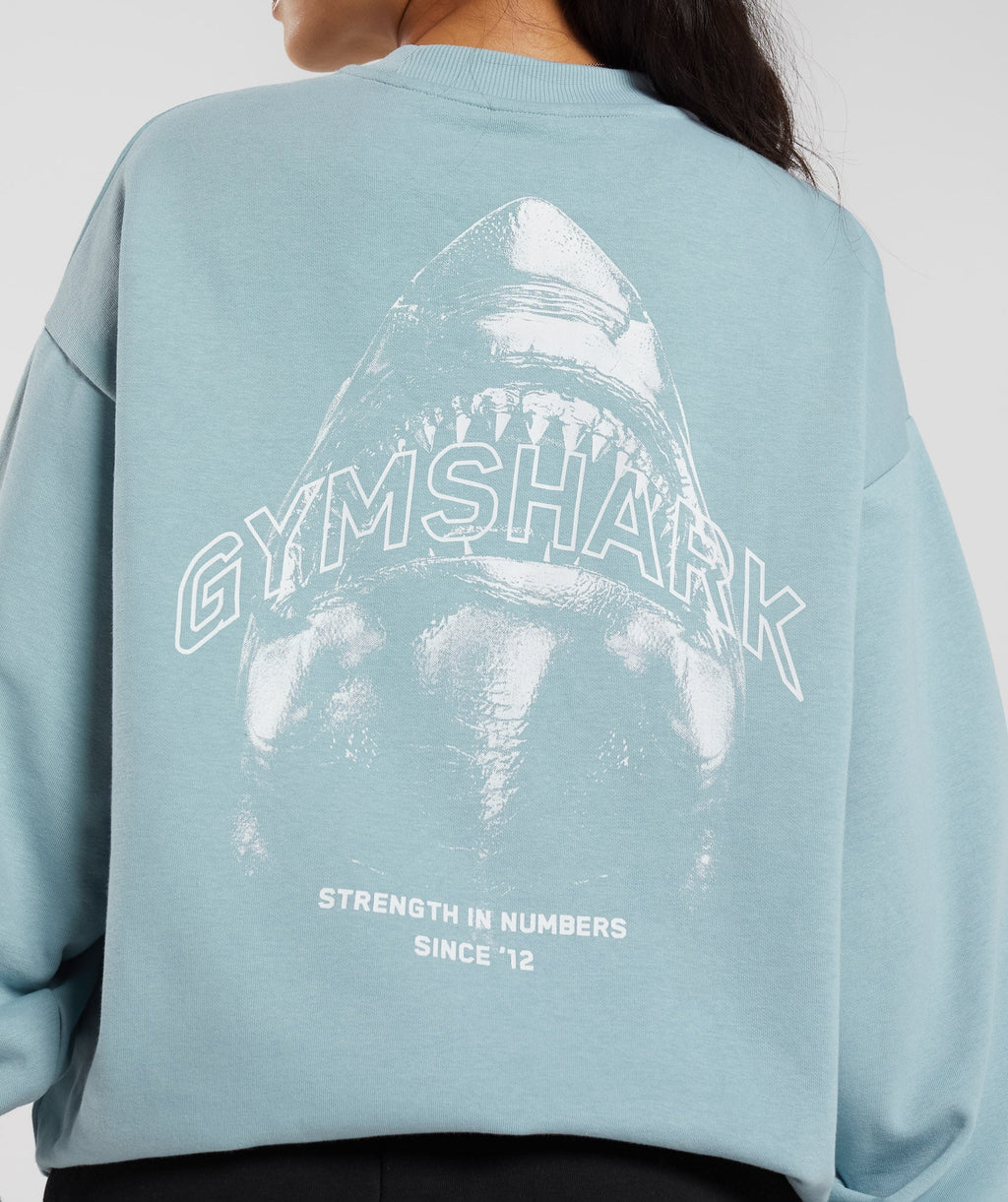 gymshark-shark-attack-oversized-sweatshirt-blue-aw23