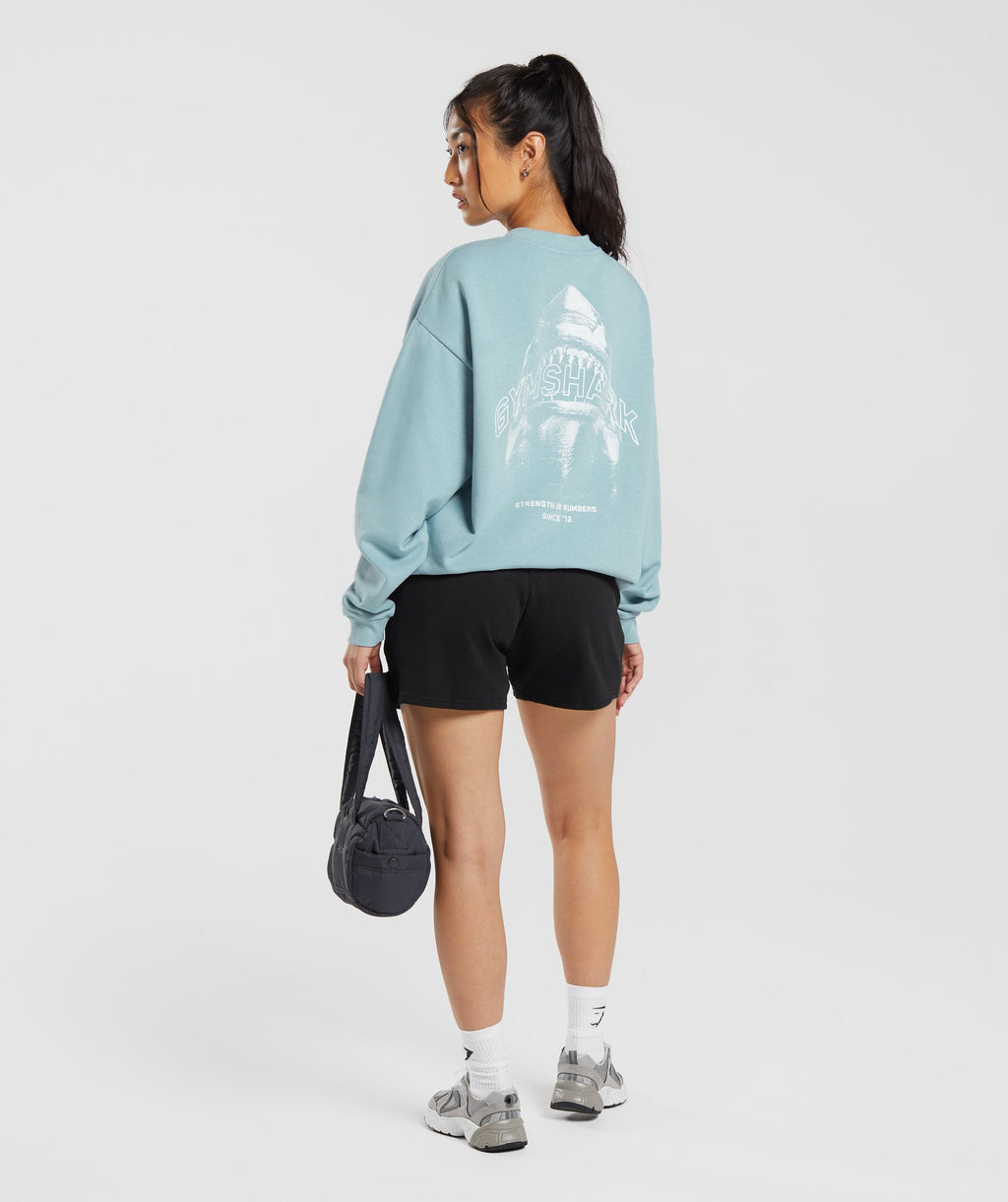 gymshark-shark-attack-oversized-sweatshirt-blue-aw23