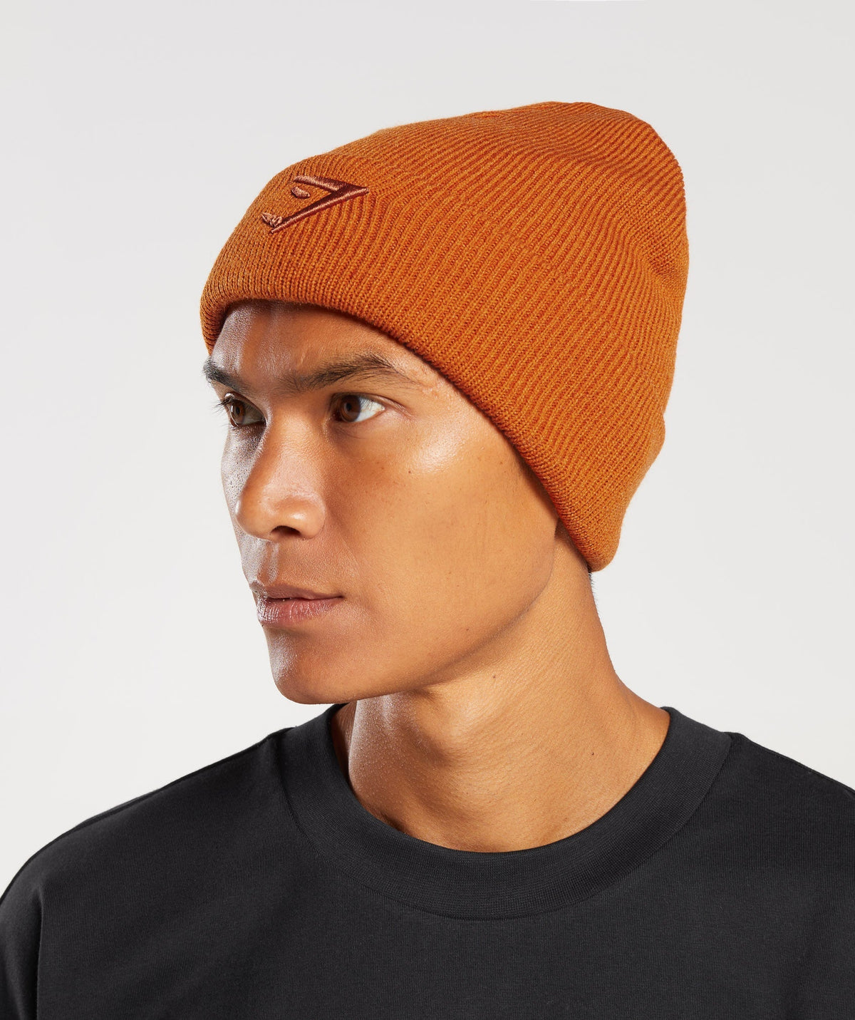 gymshark-sharkhead-beanie-charred-orange-aw23