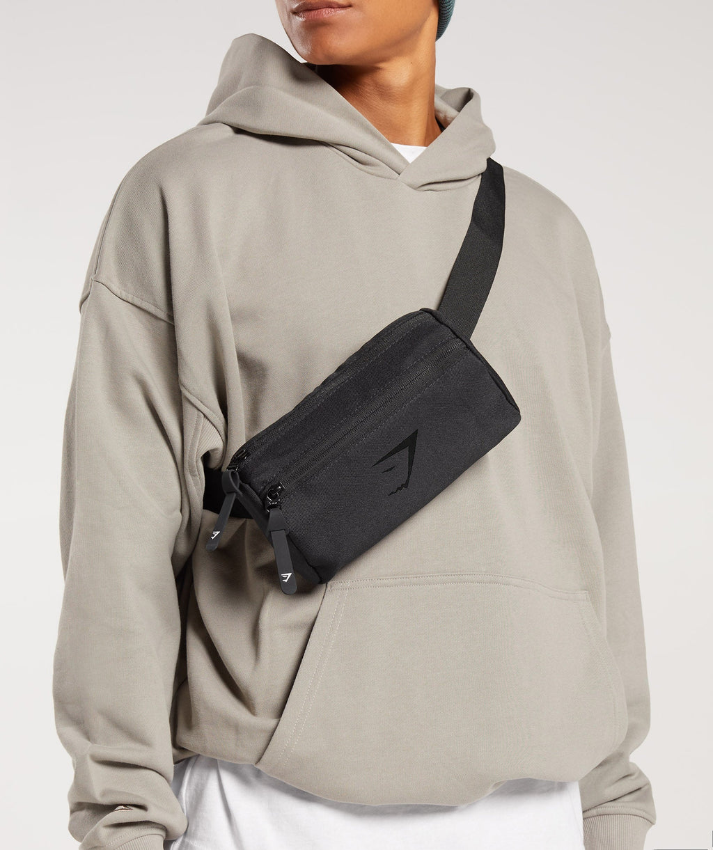 gymshark-sharkhead-cross-body-black-aw23