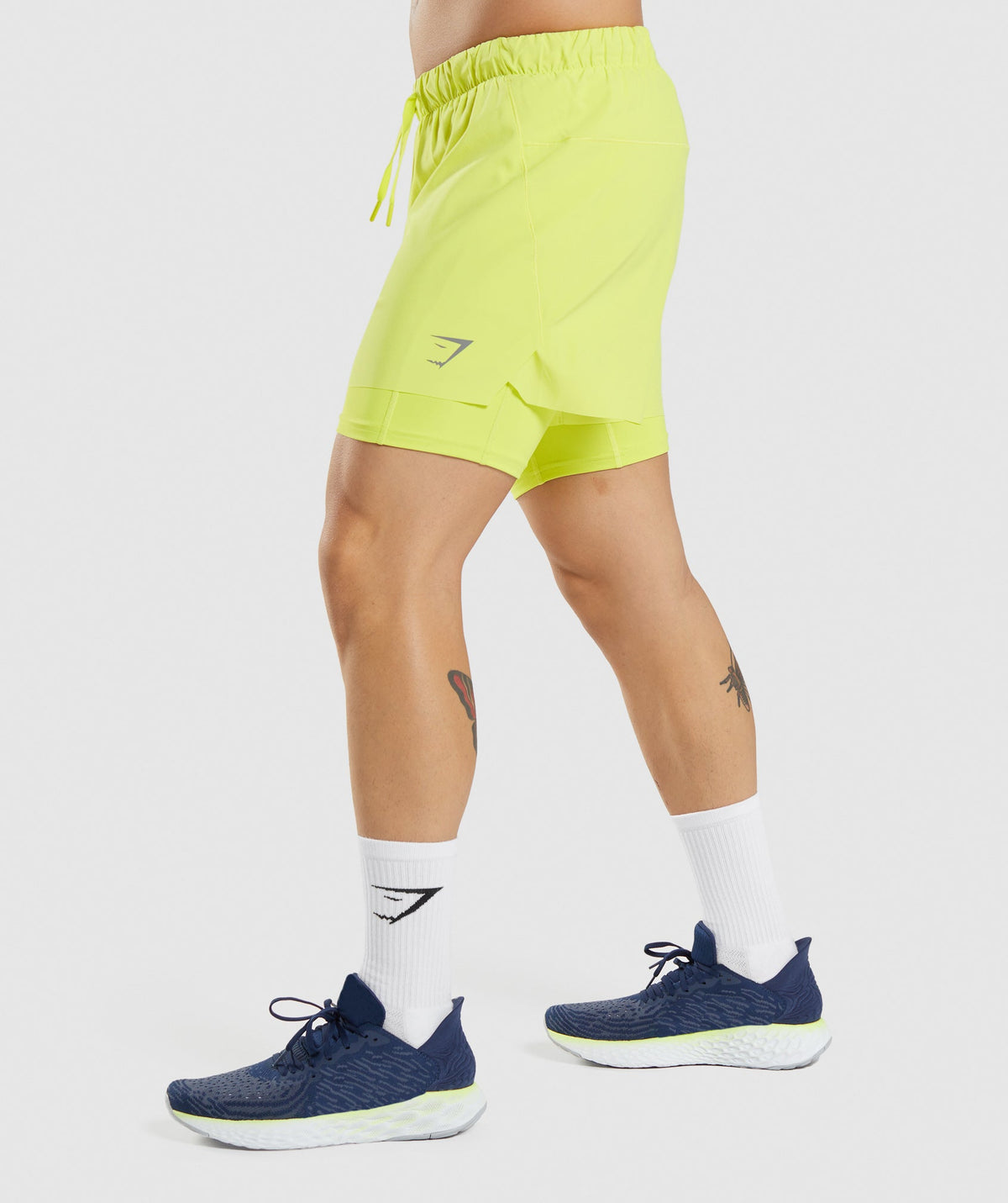 gymshark-speed-5-2-in-1-shorts-yellow-aw21