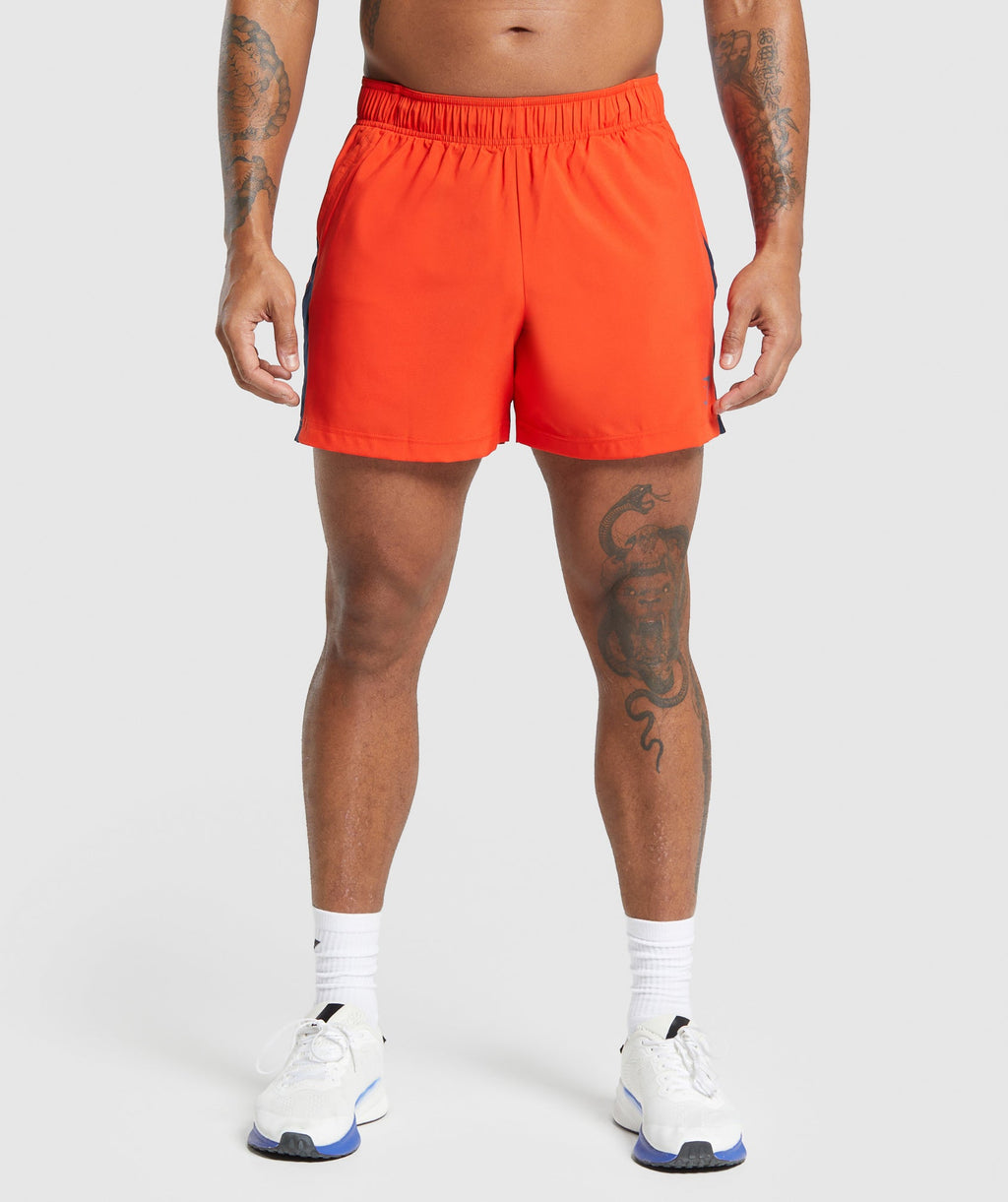 gymshark-sport-5-shorts-electric-orange-navy-aw23