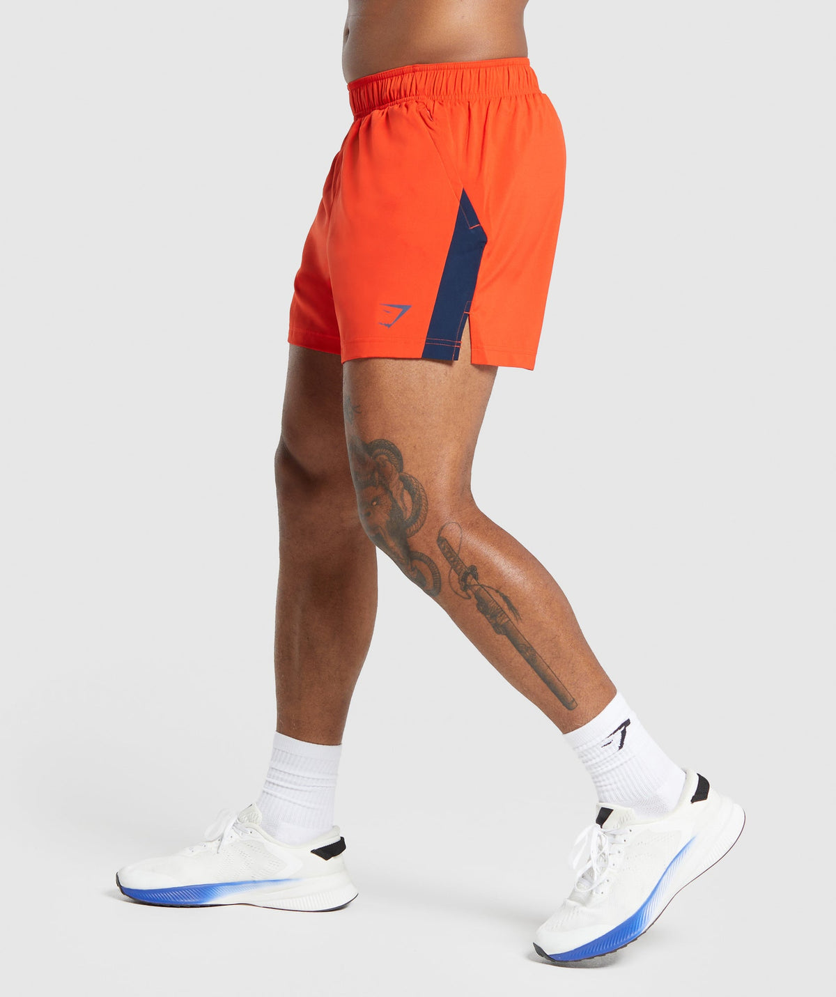 gymshark-sport-5-shorts-electric-orange-navy-aw23