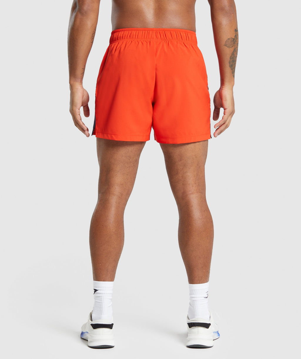 gymshark-sport-5-shorts-electric-orange-navy-aw23