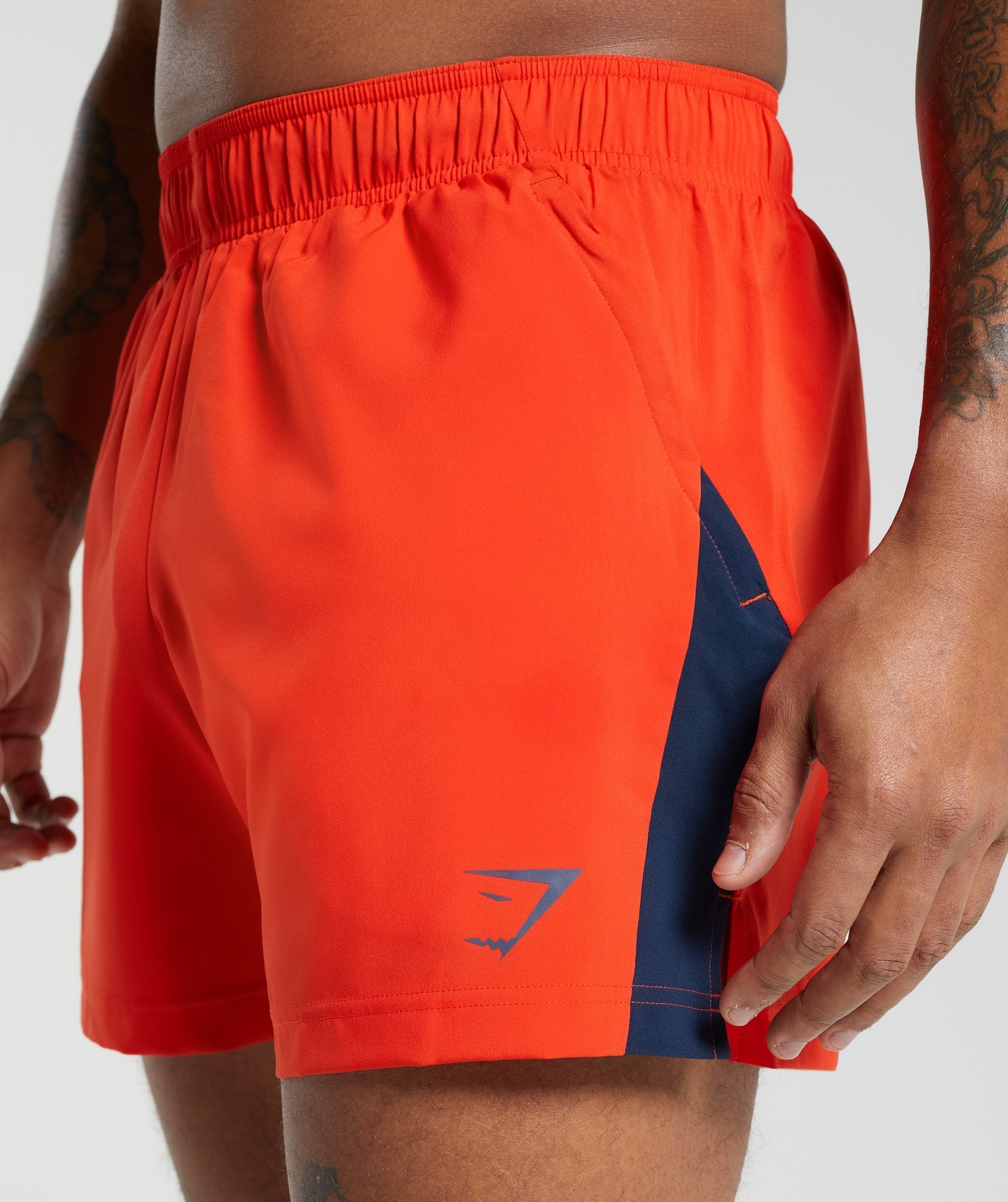 gymshark-sport-5-shorts-electric-orange-navy-aw23