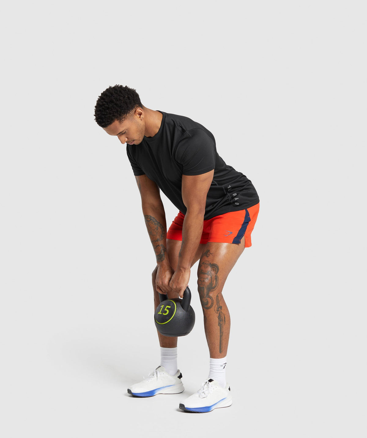 gymshark-sport-5-shorts-electric-orange-navy-aw23