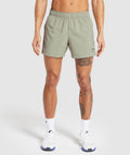 gymshark-sport-5-shorts-chalk-green-strength-green-ss24