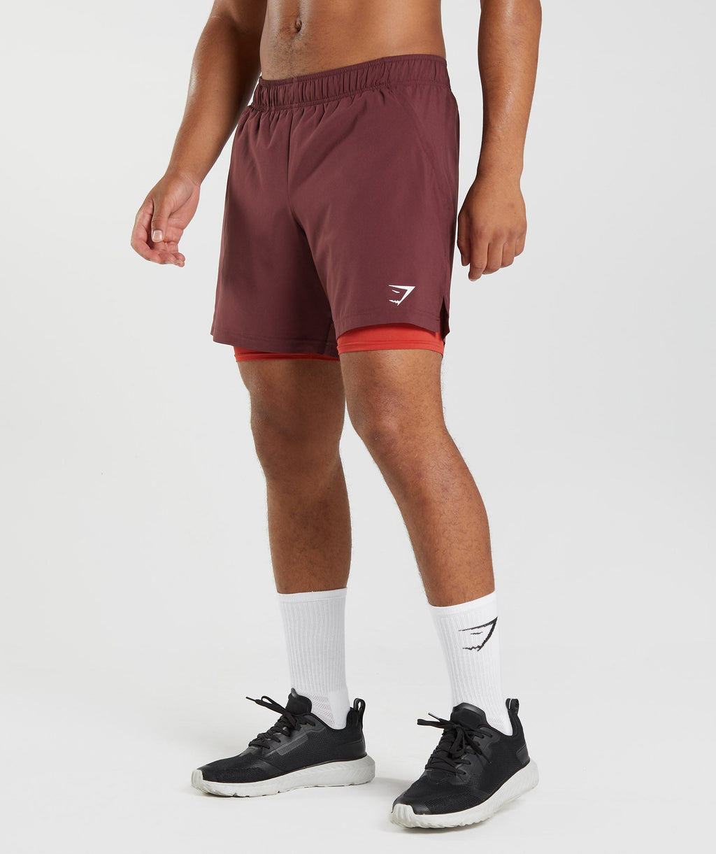 gymshark-sport-7-2-in-1-shorts-baked-maroon-salsa-red-aw22