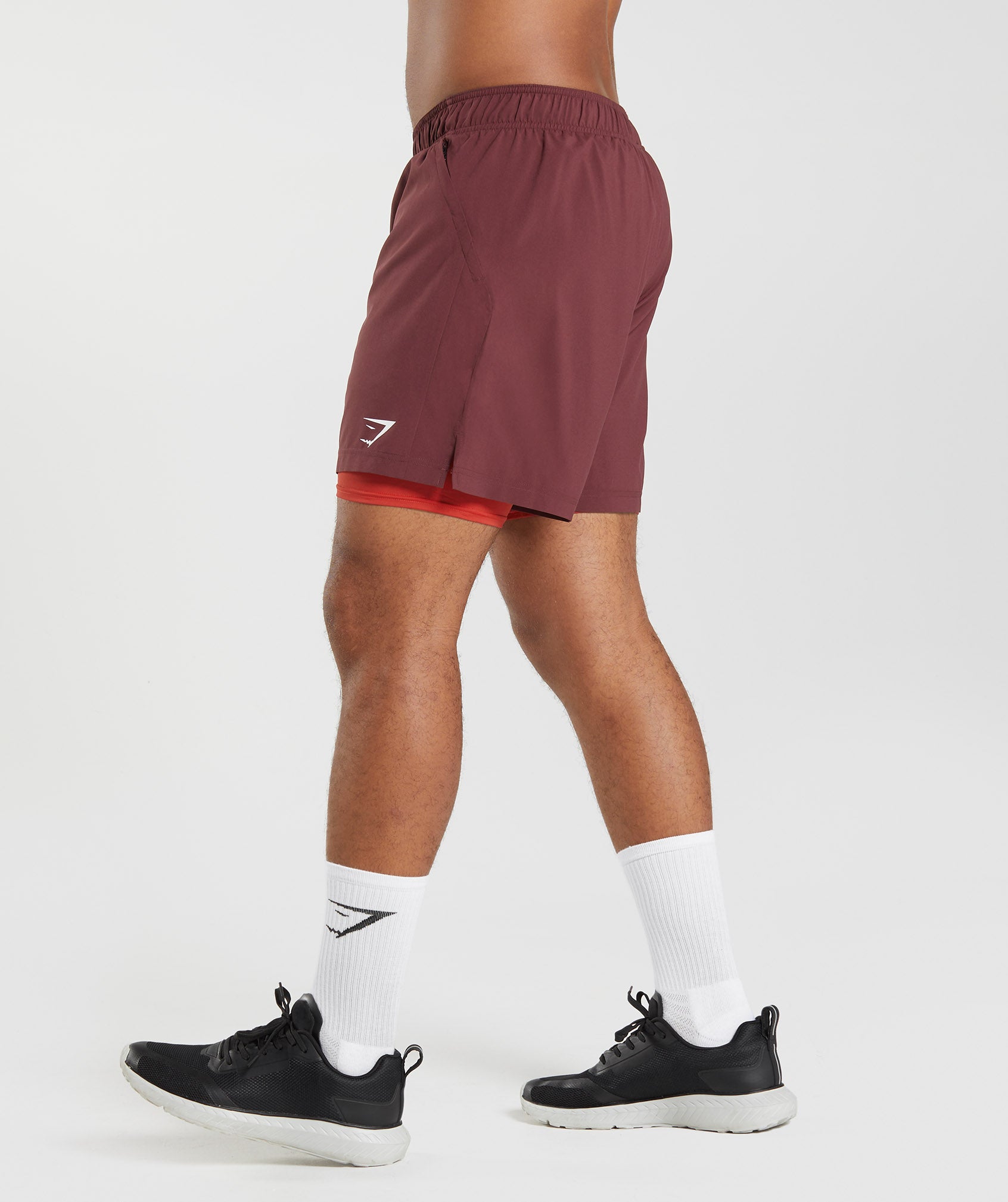 gymshark-sport-7-2-in-1-shorts-baked-maroon-salsa-red-aw22
