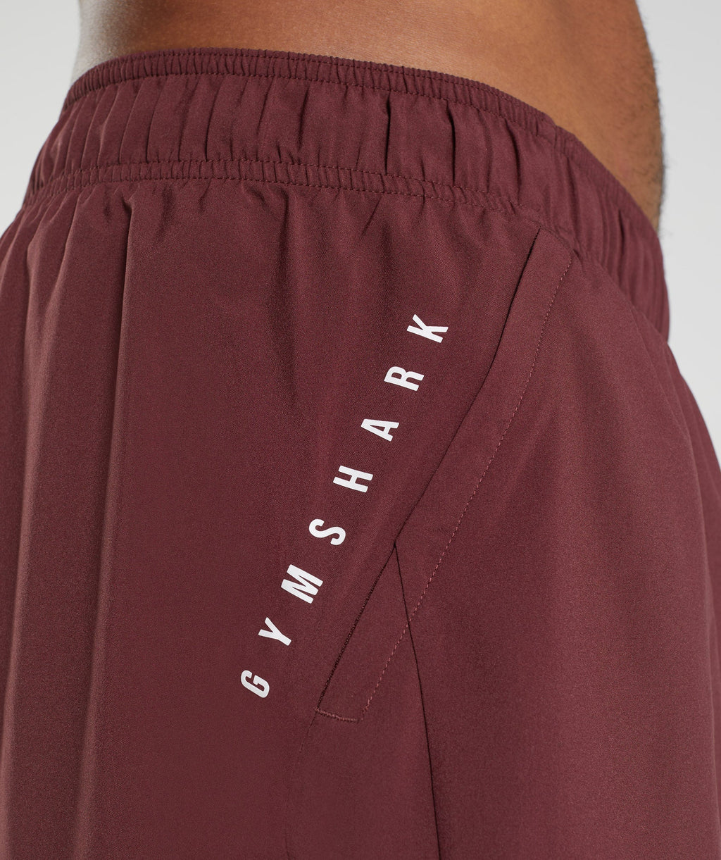 gymshark-sport-7-2-in-1-shorts-baked-maroon-salsa-red-aw22
