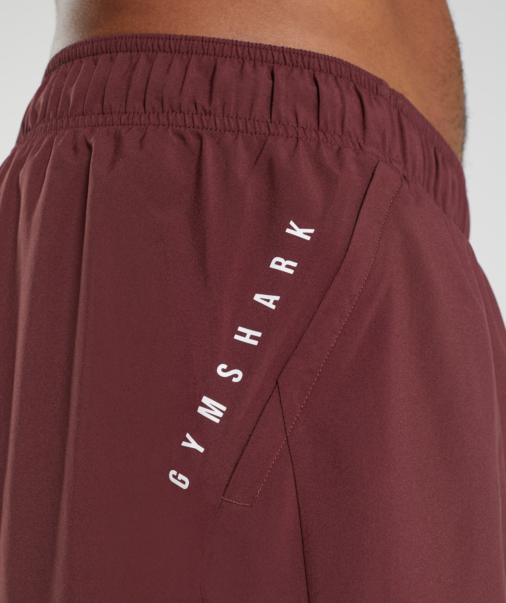 gymshark-sport-7-2-in-1-shorts-baked-maroon-salsa-red-aw22