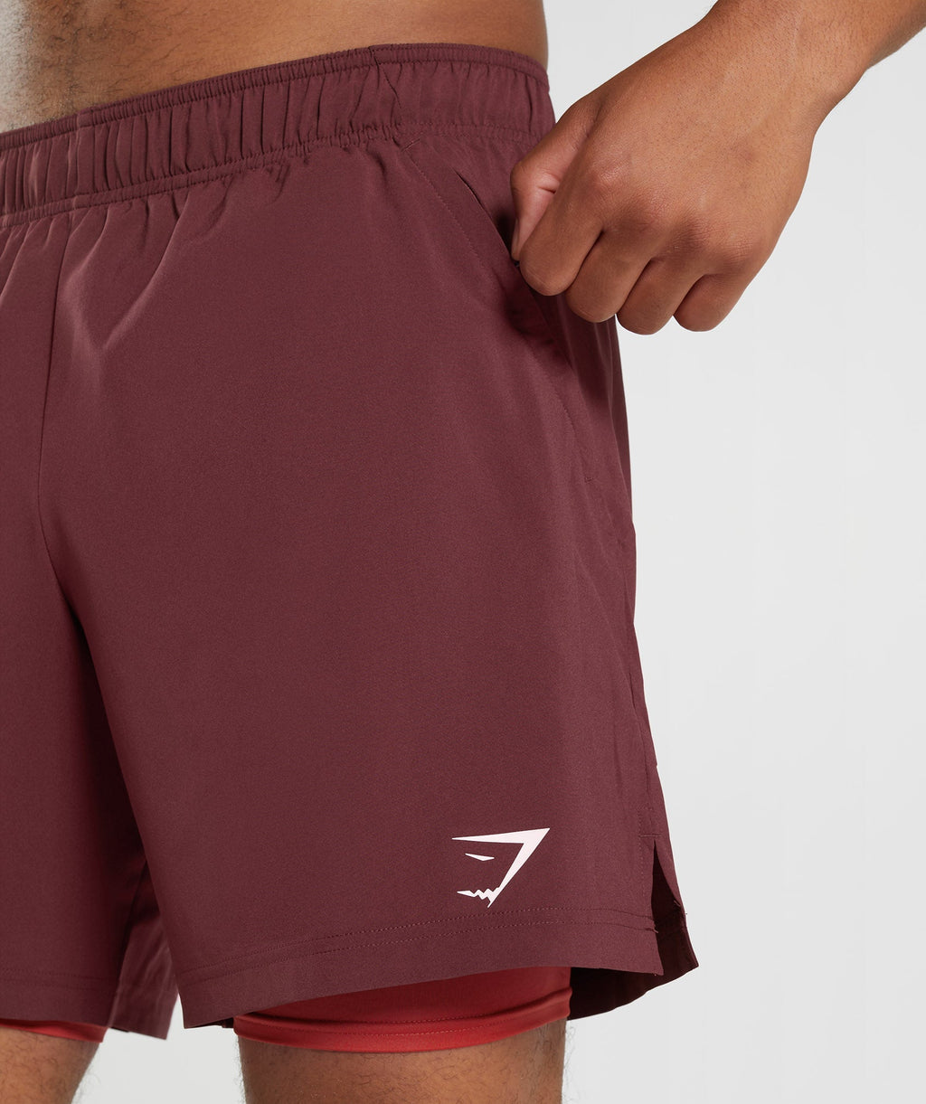 gymshark-sport-7-2-in-1-shorts-baked-maroon-salsa-red-aw22