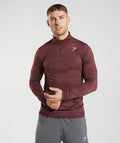 gymshark-sport-seamless-1-4-zip-baked-maroon-rosewood-red-aw22