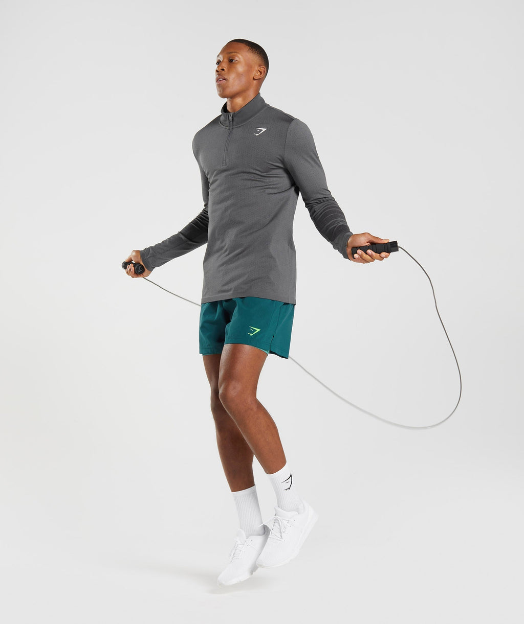 gymshark-sport-seamless-1-4-zip-silhouette-grey-black-aw22