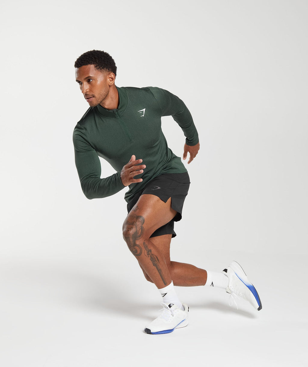 gymshark-sport-seamless-1-4-zip-fog-green-black-aw23