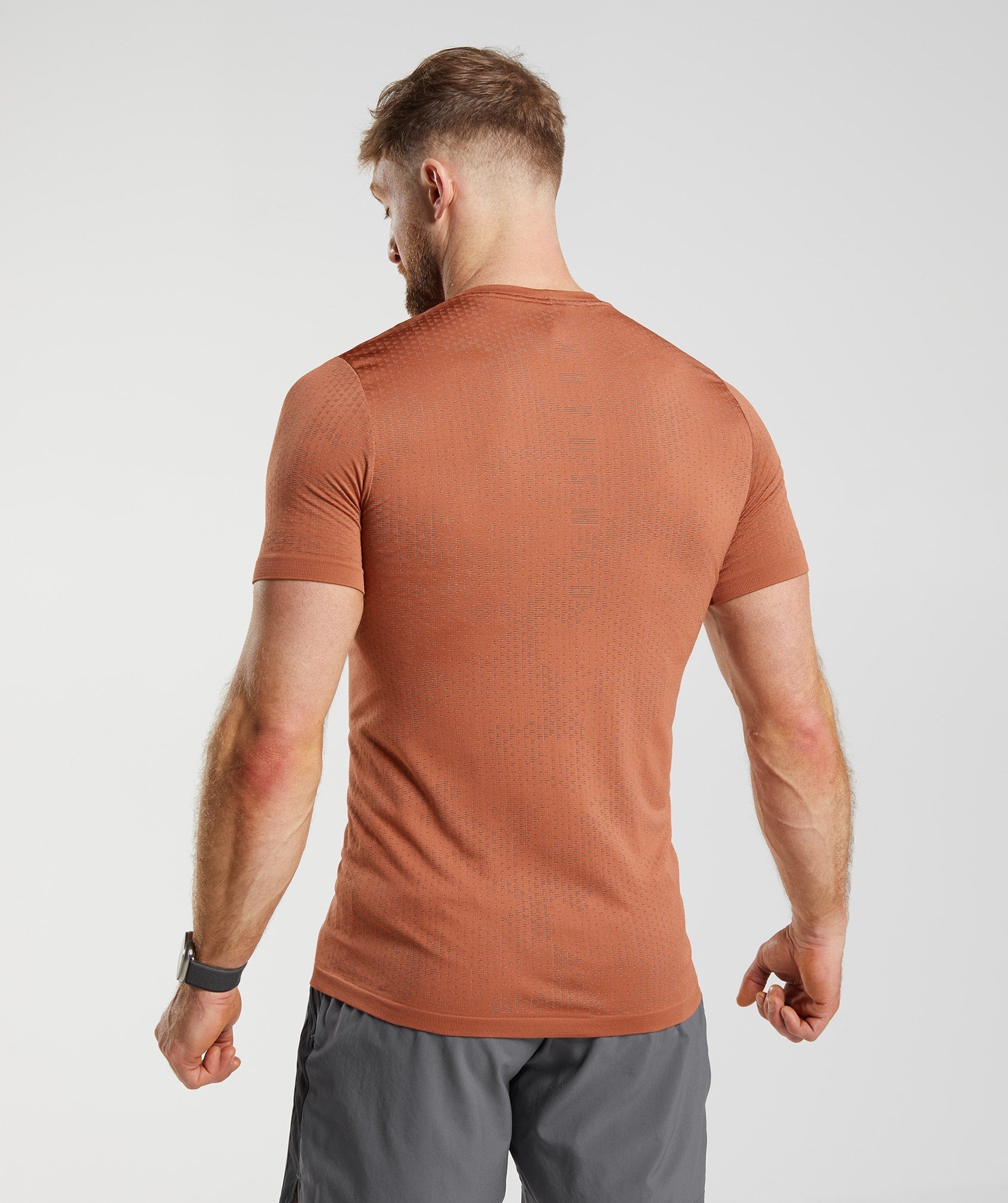 gymshark-sport-seamless-t-shirt-persimmon-red-warm-brown-ss23